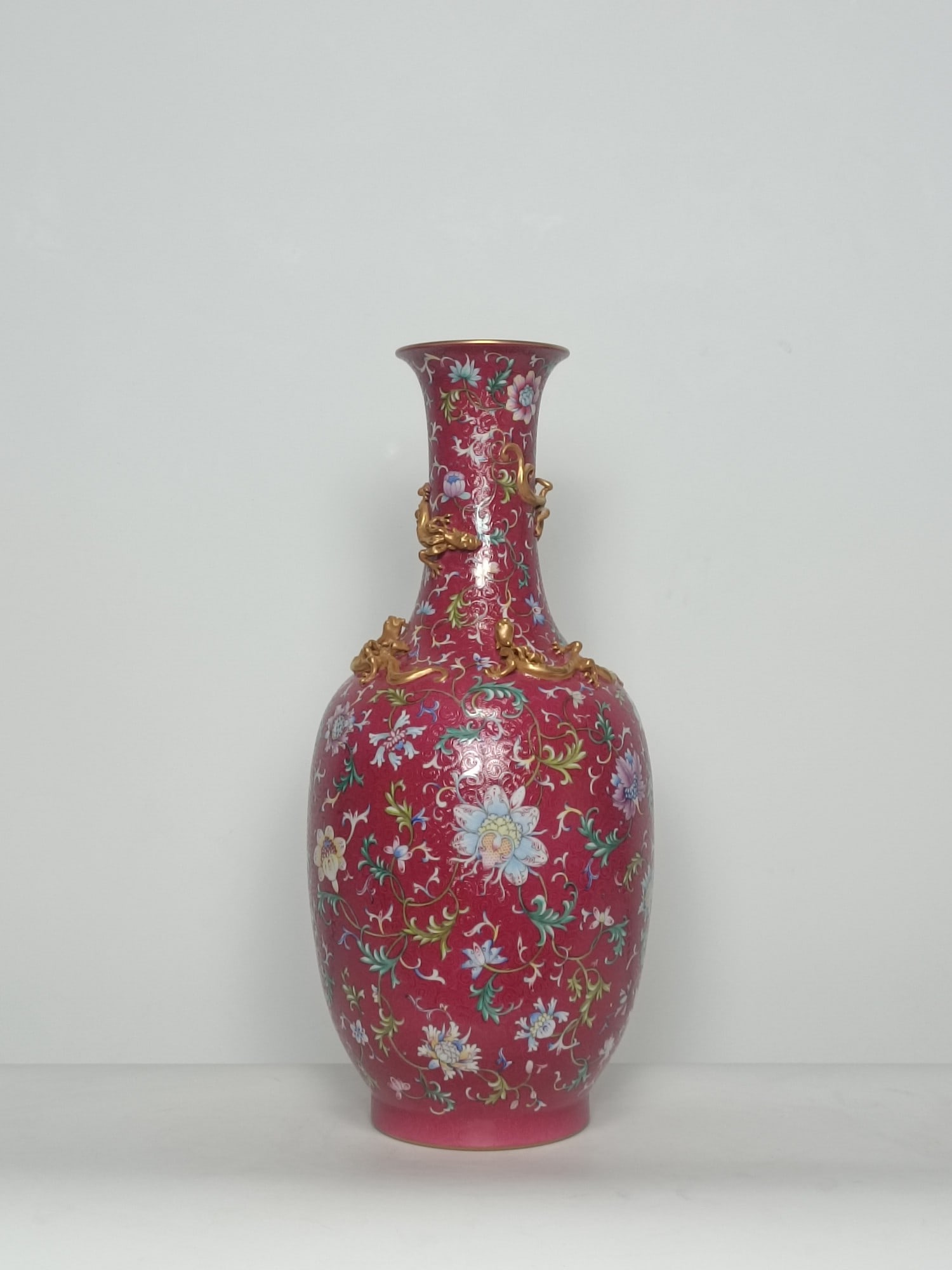 A Huge Enamel Ruby Red-Glazed Lotus Pattern Vase: A Huge Enamel Ruby Red-Glazed Lotus Pattern Vase,Qing Dynasty,China,Qianlong Four-character Mark,Size:21.7inx9.4in 珐琅彩胭脂红缠枝莲纹ī