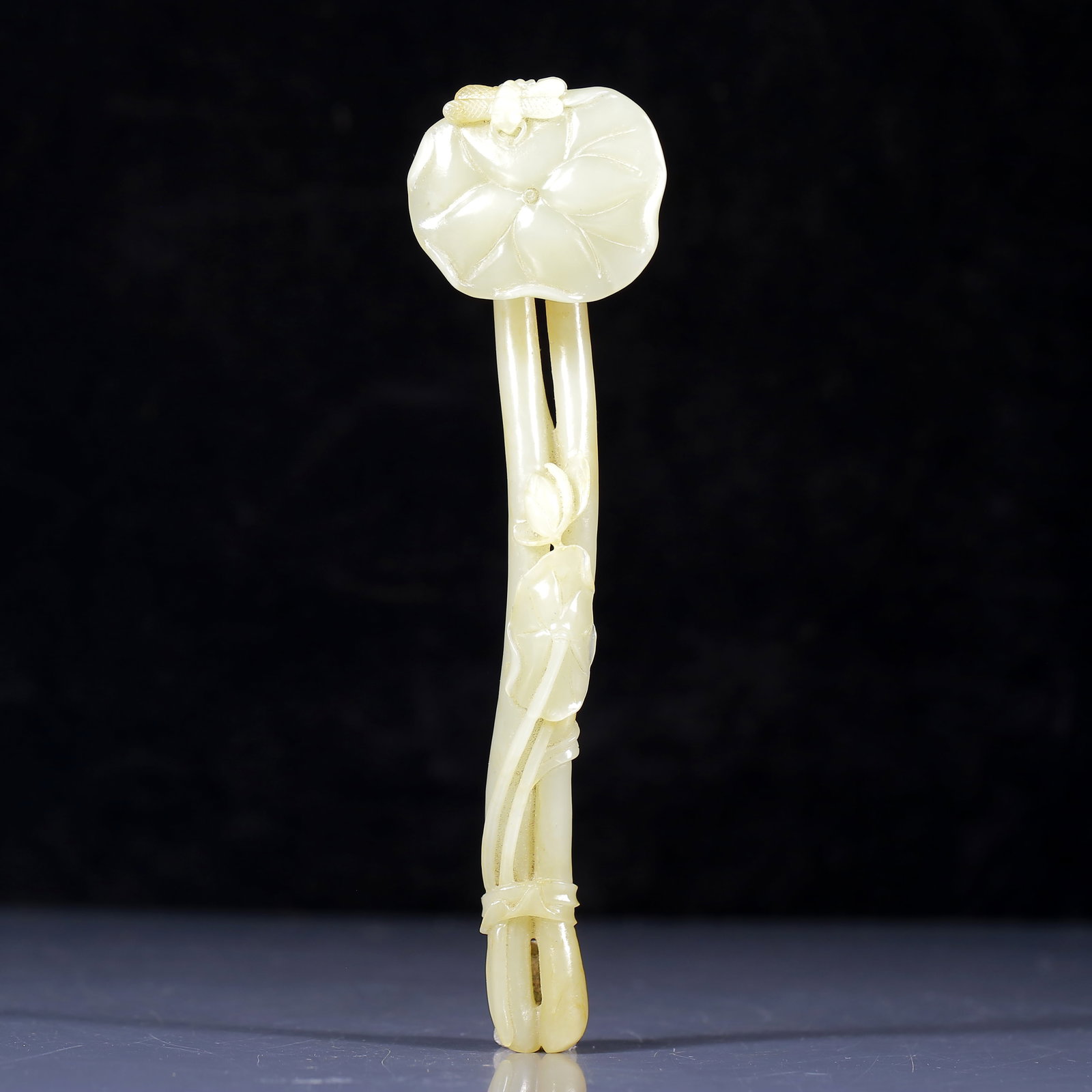 An Exquisite White Jade Lotus Pattern Ruyi: An Exquisite White Jade Lotus Pattern Ruyi,Qing Dynasty, China,Qianlong Four-character Mark,Size:7.7inx2inx1in,Weight:115g 白玉莲纹如意，清代ʌ