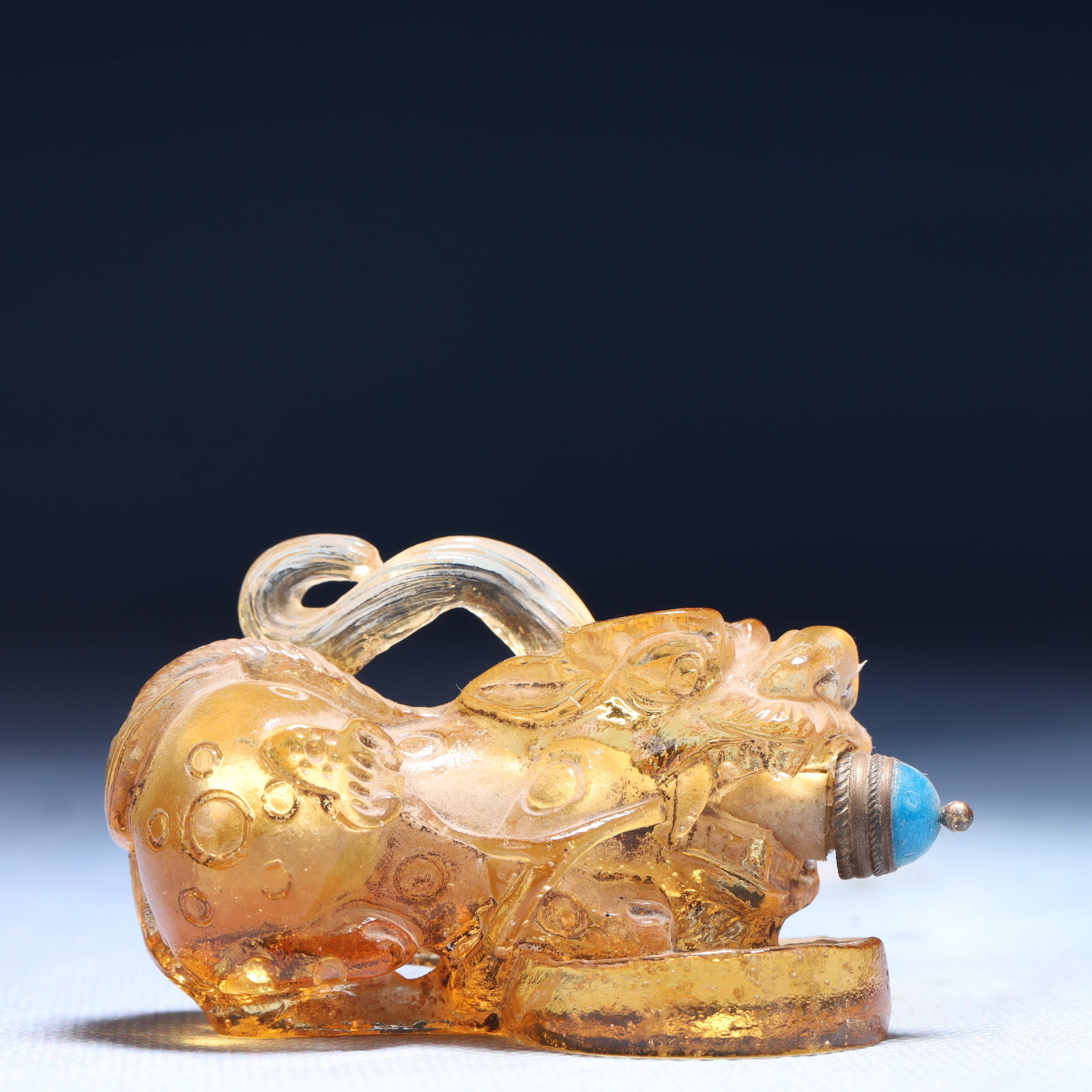 An Exquisite Crystal Auspicious Beast Snuff Bottle: An Exquisite Crystal Auspicious Beast Snuff Bottle,Qing Dynasty,China,Size:2.4inx1.2inx1.6in,Weight:83g 水晶瑞兽鼻烟壶,中国清代
