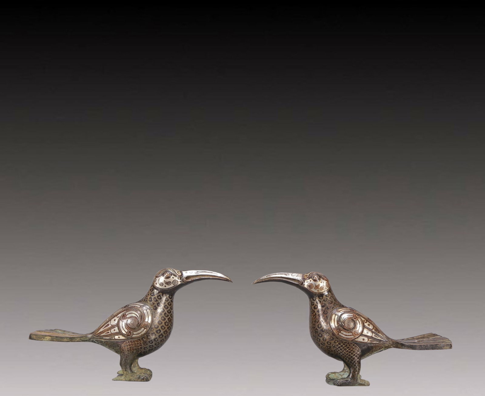 A Exquisite A pair of Gilt Bronze Silver-Inlaid Bronze Bird Ornament: A Exquisite A pair of Gilt Bronze Silver-Inlaid Bronze Bird Ornament Ancient Time, China ,Size:7.9inx2.4inx4.3in Weight:1200g 一对铜鎏金错银鸟 远&