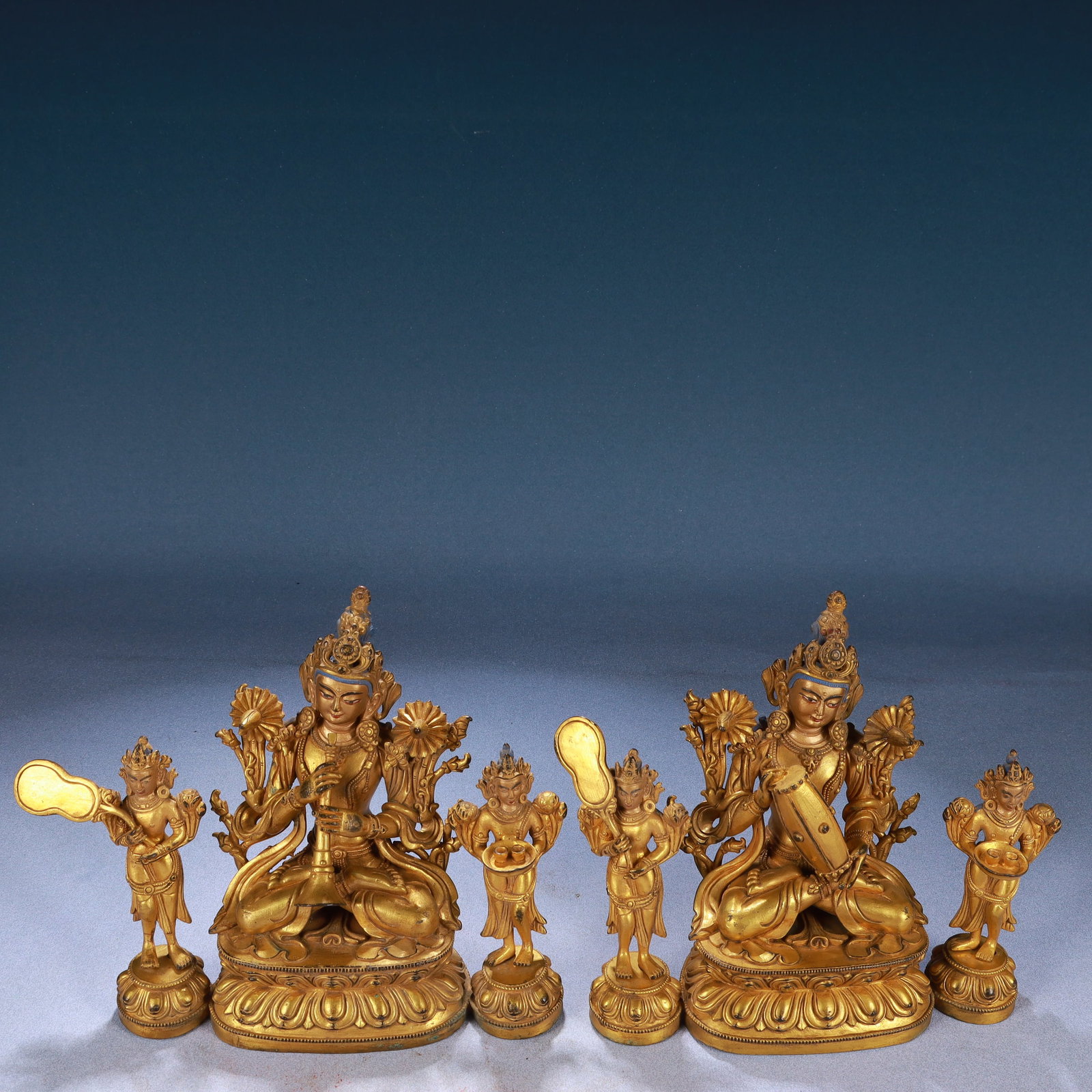A Set of Solemn Gilt Bronze Buddha Statue: A Set of Solemn Gilt Bronze Buddha Statue,Qing Dynasty, China,Size:7.1inx3.1inx6.7in,Weight:9800g 一套铜鎏金佛像,中国清代
