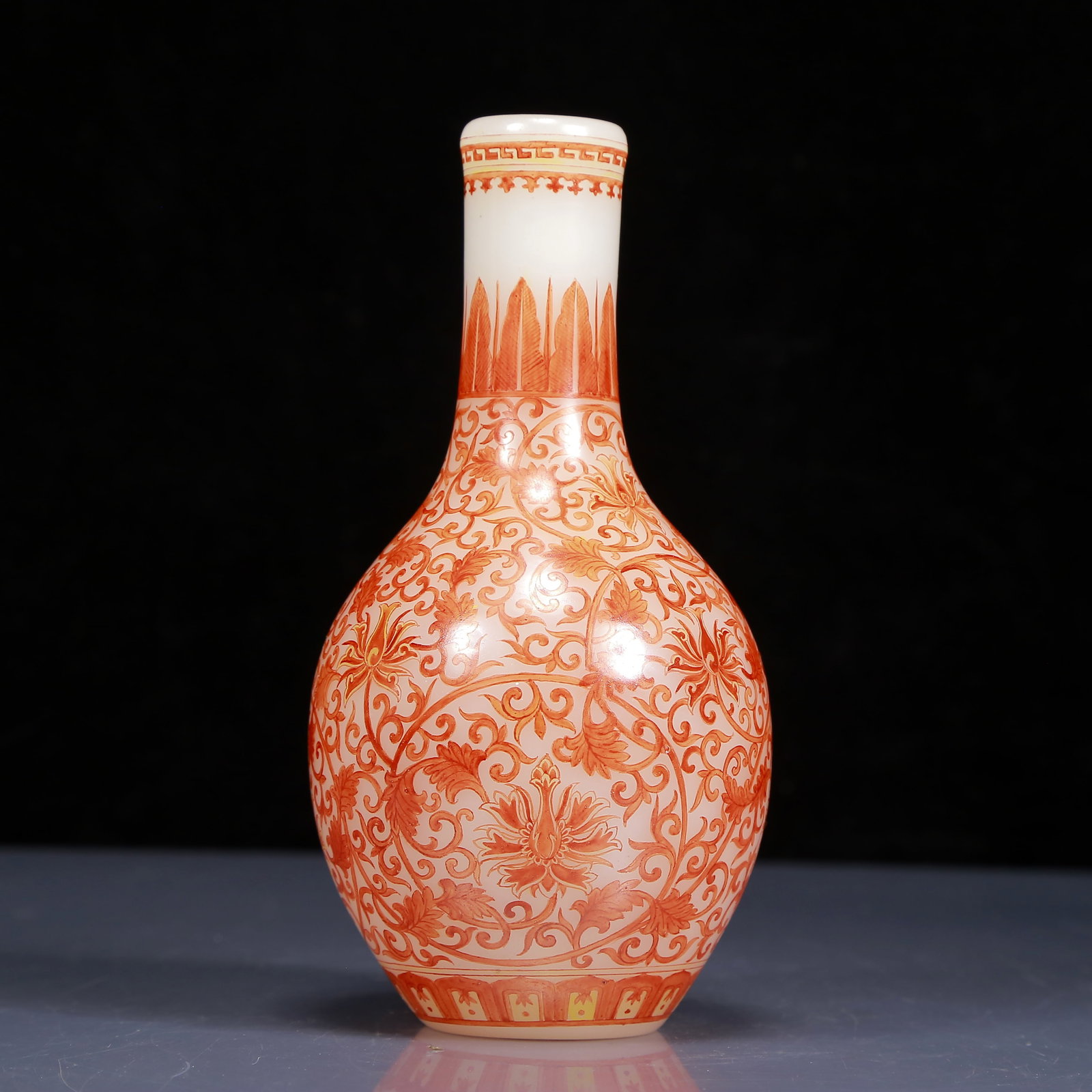 An Exquisite Glass Iron-Red Lotus Pattern Vase: An Exquisite Glass Iron-Red Lotus Pattern Vase,Qing Dynasty, China,Qianlong Four-character Mark,Size:3.5inx7.5in,Weight:340g 琉璃矾红缠枝莲纹瓶