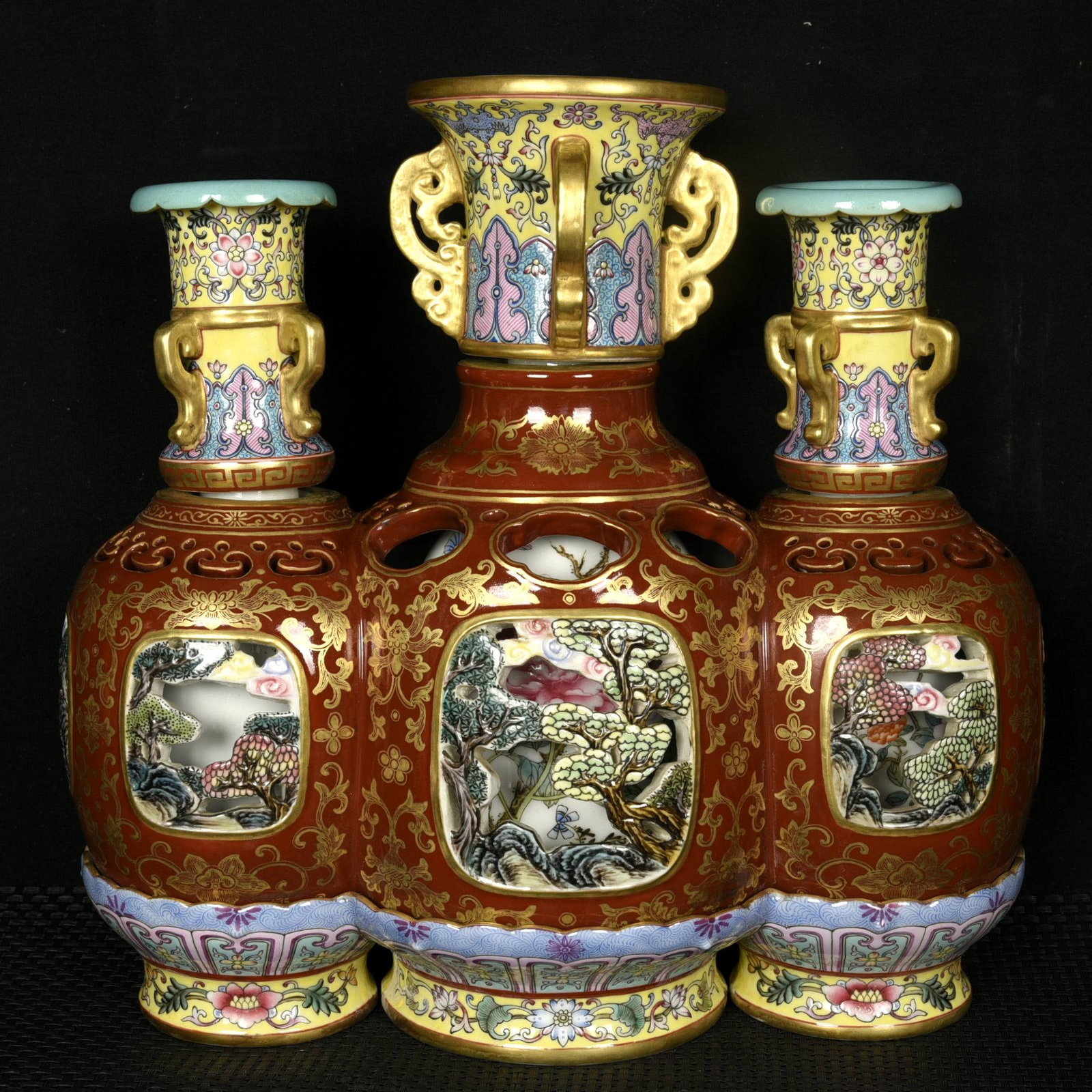 An Exquisite Red Ground Enamel Landscape Pattern Double-Ears Vase: An Exquisite Red Ground Enamel Landscape Pattern Double-Ears Vase,Qing Dynasty,China,Qianlong Six-character Mark,Size:10.6inx11inx5.9in 红地珐琅彩山水纹