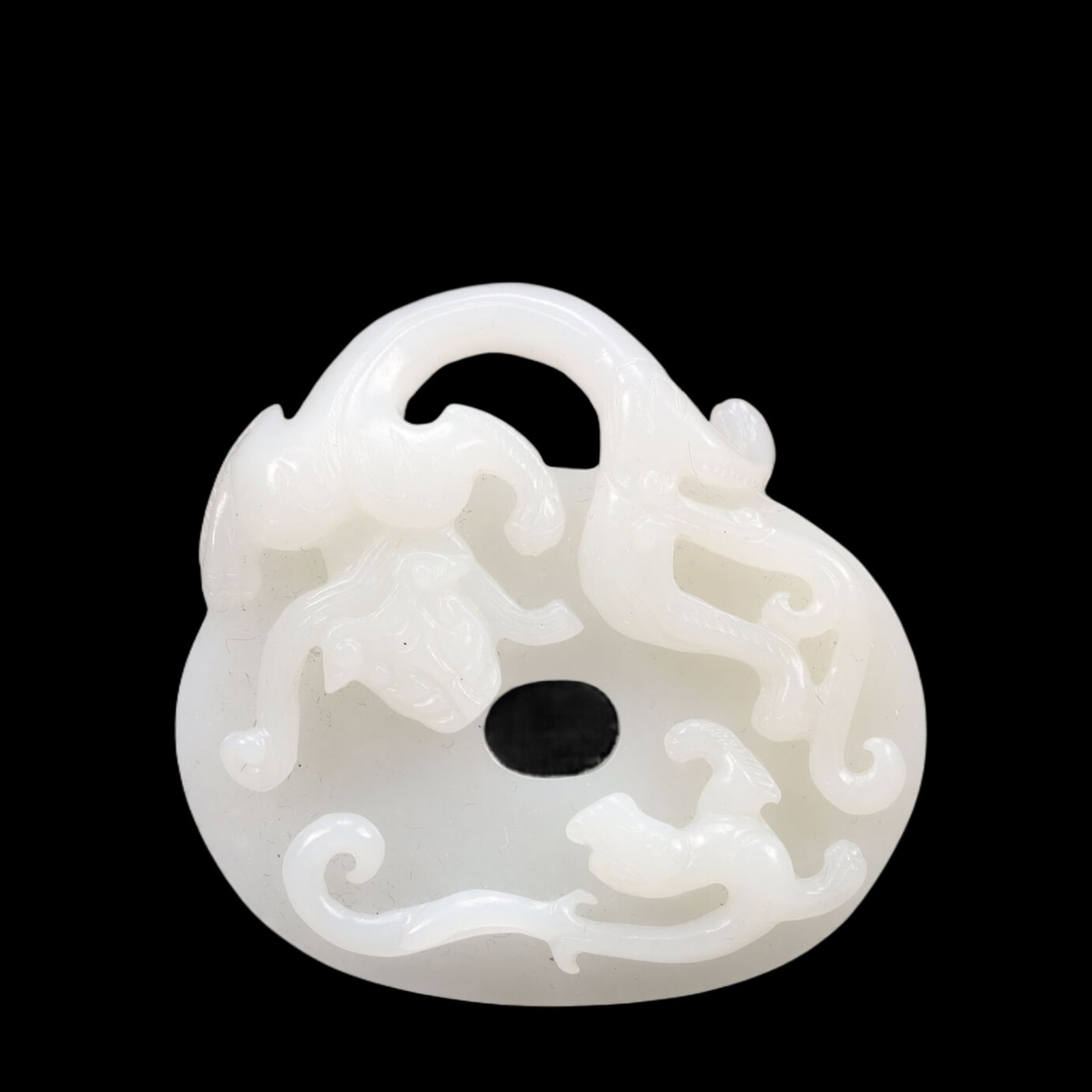 An Exquisite White Jade Dragon Pattern Pendant (1 of 4)