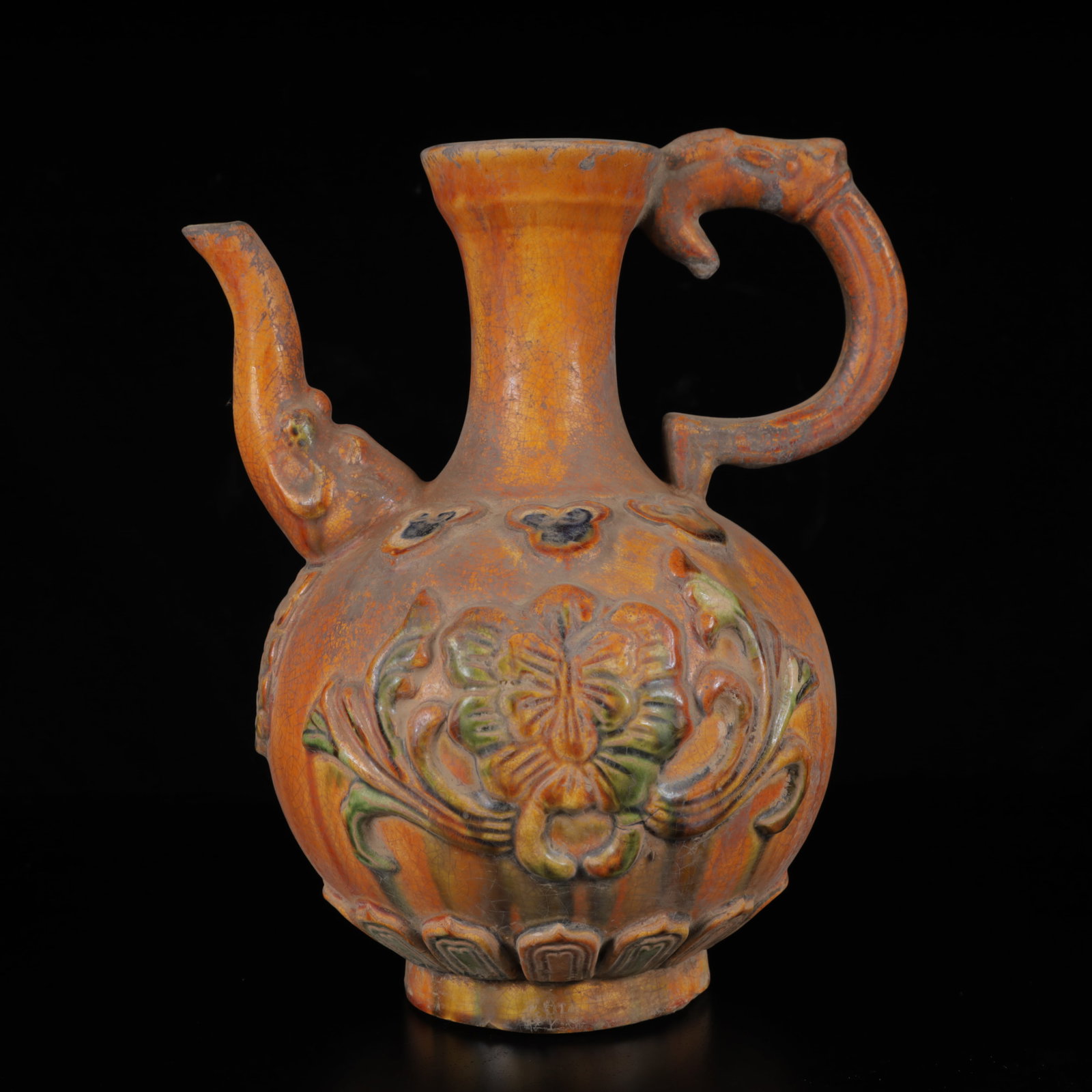 An Exquisite Tang Tri-Color Glazed PotteryDragon and Flower Pattern Ewer: An Exquisite Tang Tri-Color Glazed PotteryDragon and Flower Pattern Ewer,Tang Dynasty,China,Size:9.1inx7.5inx6.3in,Weight:1050g 唐三彩龙花卉纹执壶