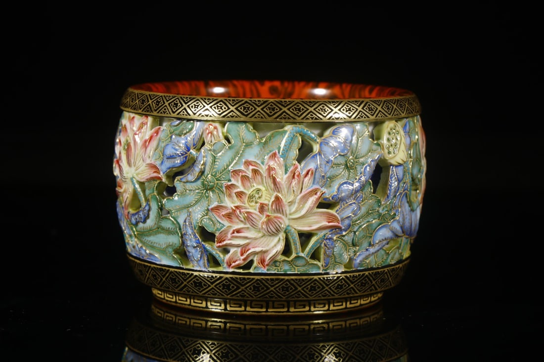 An Exquisite Imitation Wood Grain Glazed Hollow Lotus Pattern Cup: An Exquisite Imitation Wood Grain Glazed Hollow Lotus Pattern Cup,Qing Dynasty,China,Qianlong Four-character Mark,Size:2.4inx2.6in 木纹釉镂空荷花纹Ĉ