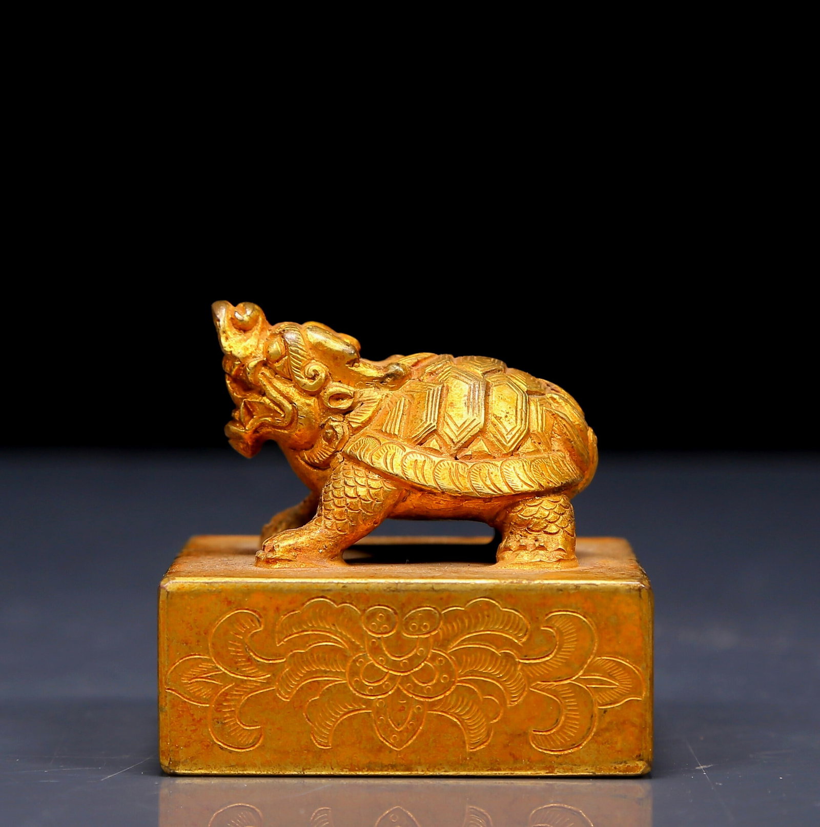 An Exquisite Gilt Bronze Auspicious Beast Seal: An Exquisite Gilt Bronze Auspicious Beast Seal，Qing Dynasty, China，Size:2.2inx2in，Weight:635g 铜鎏金玄武印章，清代