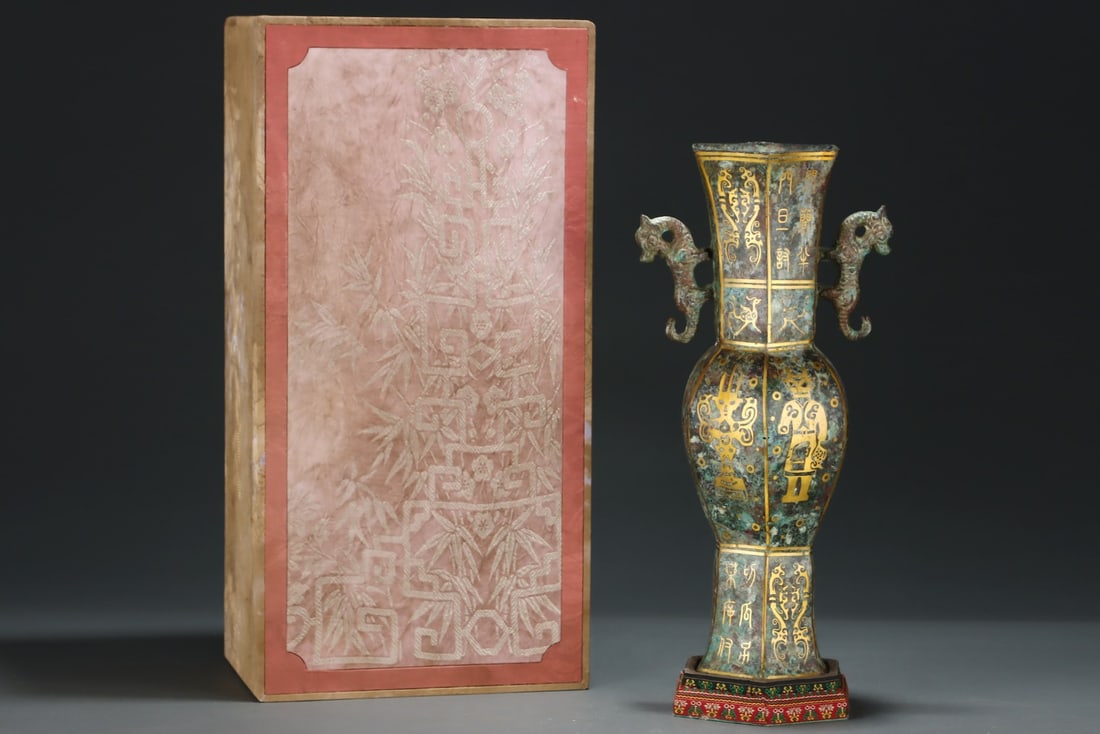 An Archaic Bronze Inlaid Gold Figure Pattern Double-Ears Vase,With Inscription: An Archaic Bronze Inlaid Gold Figure Pattern Double-Ears Vase,With Inscription,the Warring States period in China,Size:15.3inx7.3in 青铜错金人物纹双 