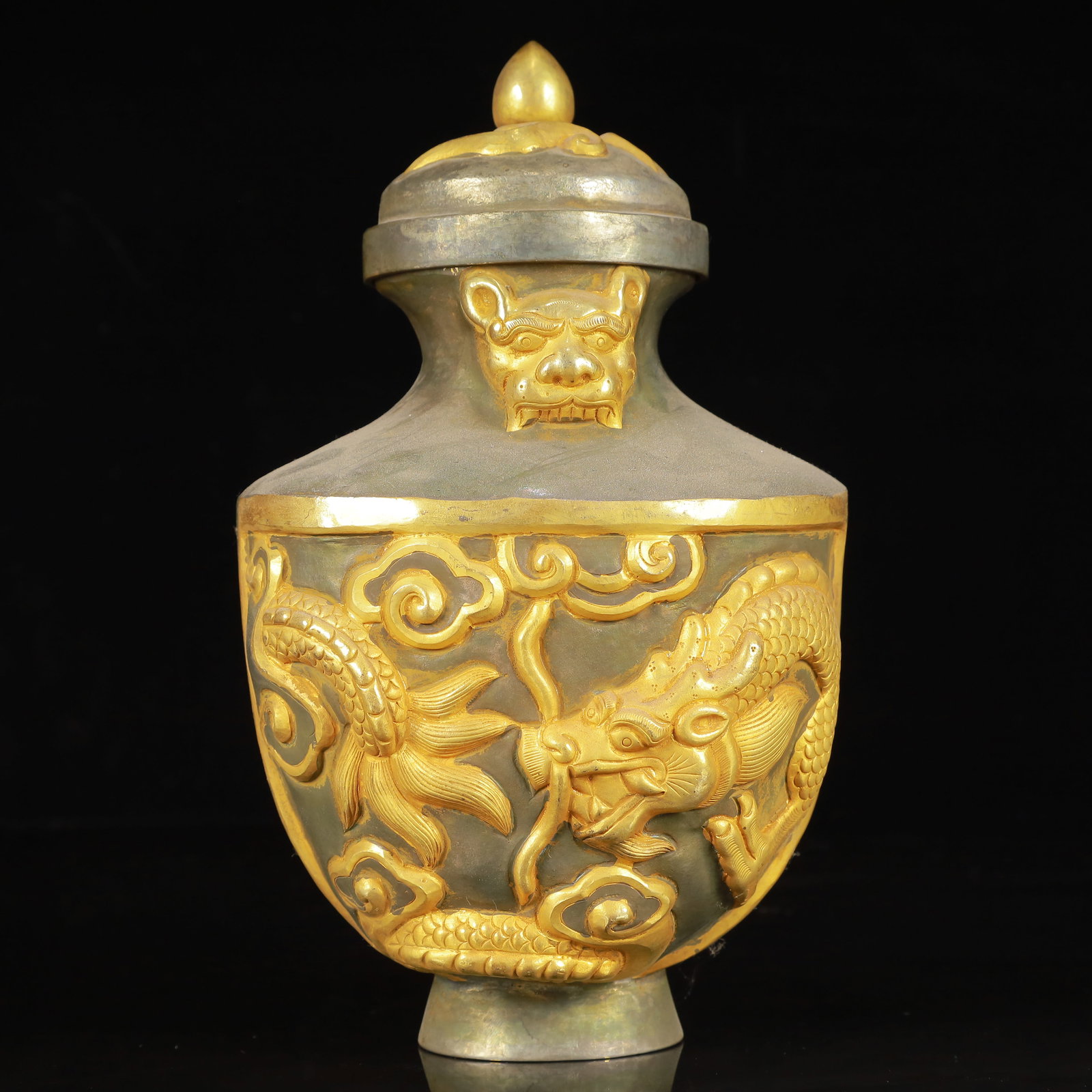 An Exquisite Gilt Silver Dragon Pattern Beast-Ears Cover Jar: An Exquisite Gilt Silver Dragon Pattern Beast-Ears Cover Jar,Tang Dynasty,China,Zhenguan Four-Character Mark,Size:5.1inx4.7inx8.7in,Weight:500g 银鎏金龙纹兽耳