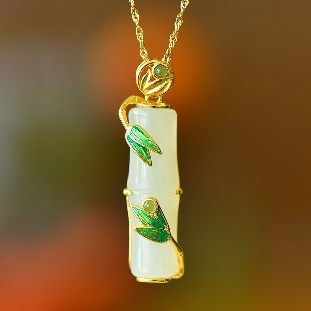 An Exquisite Sterling Silver-Gold Plated Inlaid White Jade Pendant: An Exquisite Sterling Silver-Gold Plated Inlaid White Jade Pendant 纯银镀金镶白玉吊坠