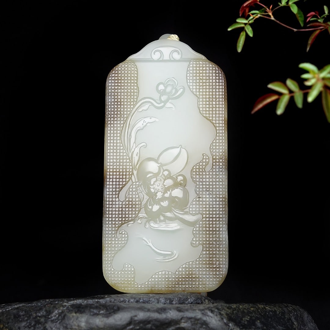 An Exquisite White Jade Lotus Pattern Pendant (1 of 6)