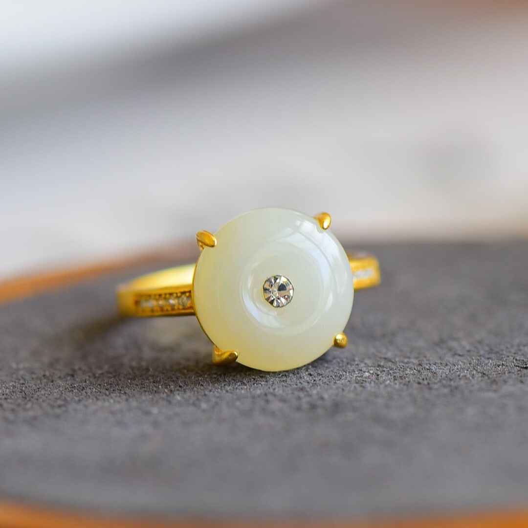An Exquisite Sterling Silver-Gold Plated Inlaid White Jade Ring , Inlaid Diamond: Sterling Silver-Gold Plated Inlaid White Jade Ring , Inlaid Diamond , Size :0.5inx0.5in 纯银镀金镶白玉戒指,嵌钻石,尺ल