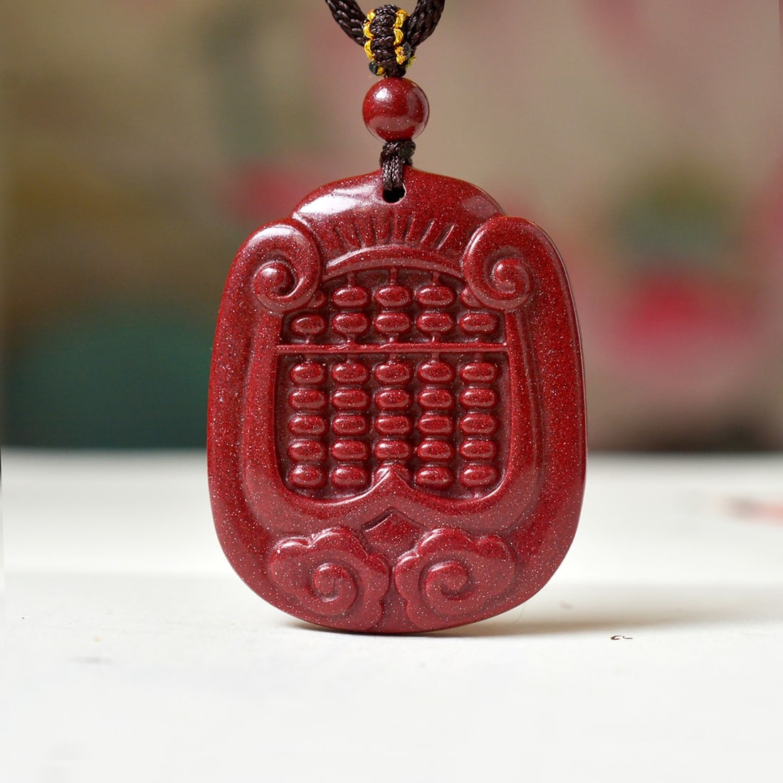 An Exquisite Cinnabar Abacus Pendant: An Exquisite Cinnabar Abacus Pendant,Size:1.3inx1.7in,Weight:25g 朱砂算盘挂件