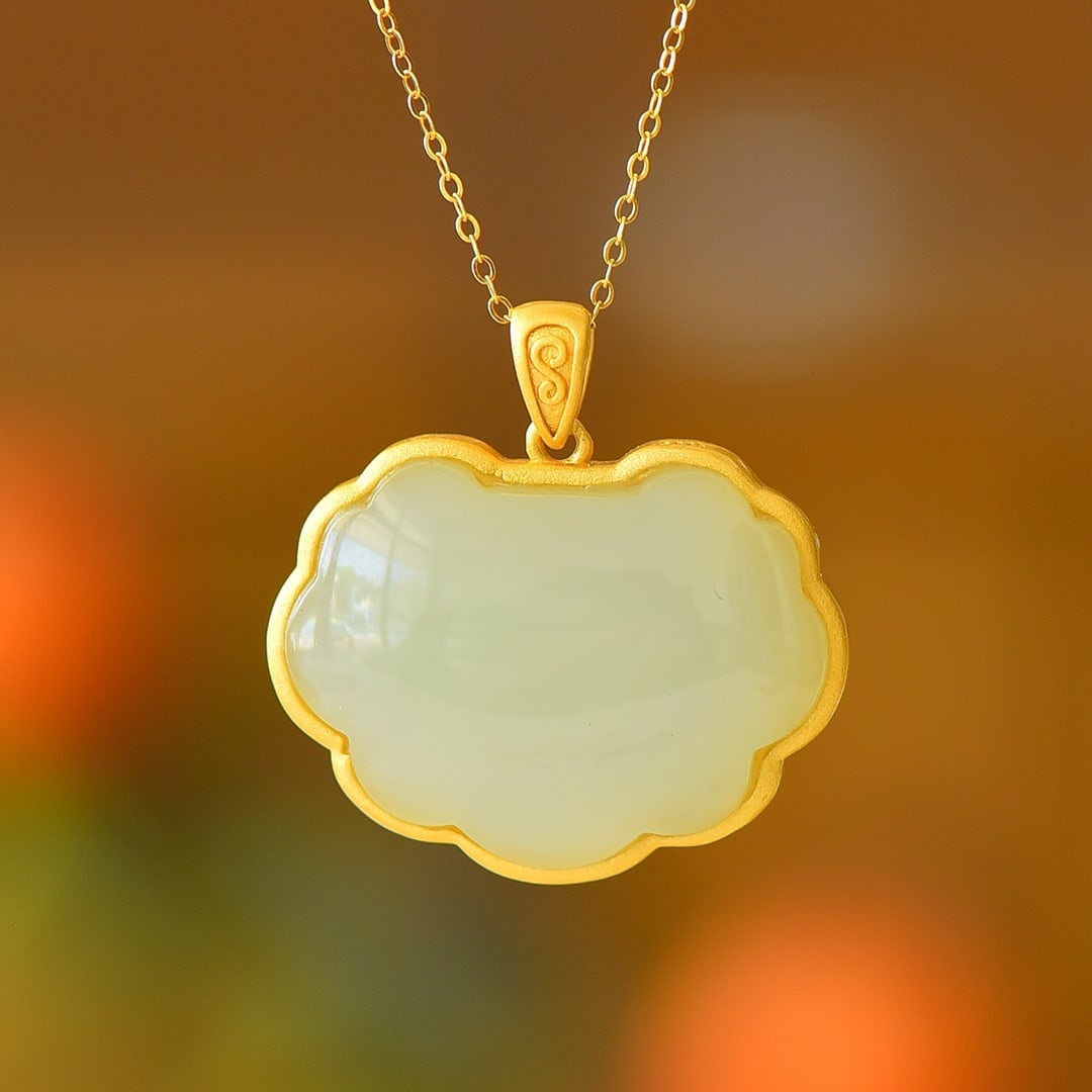 An Exquisite Sterling Silver-Gold Plated Inlaid White Jade Pendant: An Exquisite Sterling Silver-Gold Plated Inlaid White Jade Pendant,Size:0.8inx1.1in 纯银镀金镶白玉吊坠