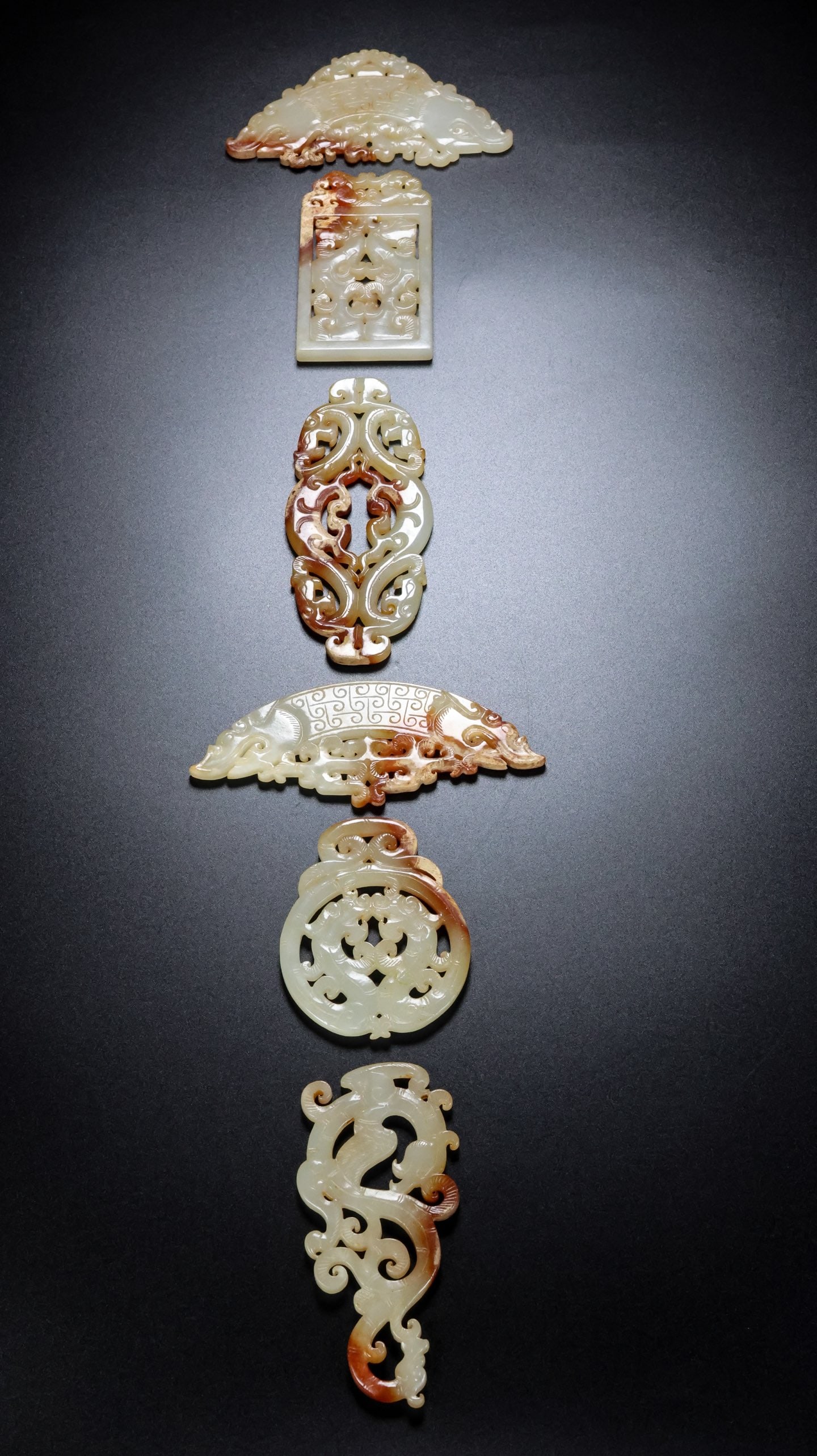 A Set of Fine White Jade Dragon Pattern Ornaments: A Set of Fine White Jade Dragon Pattern Ornaments,Qing Dynasty,China,Size:4.3inx0.2inx24in,Weight:230g 一套白玉龙纹摆件,中国清代