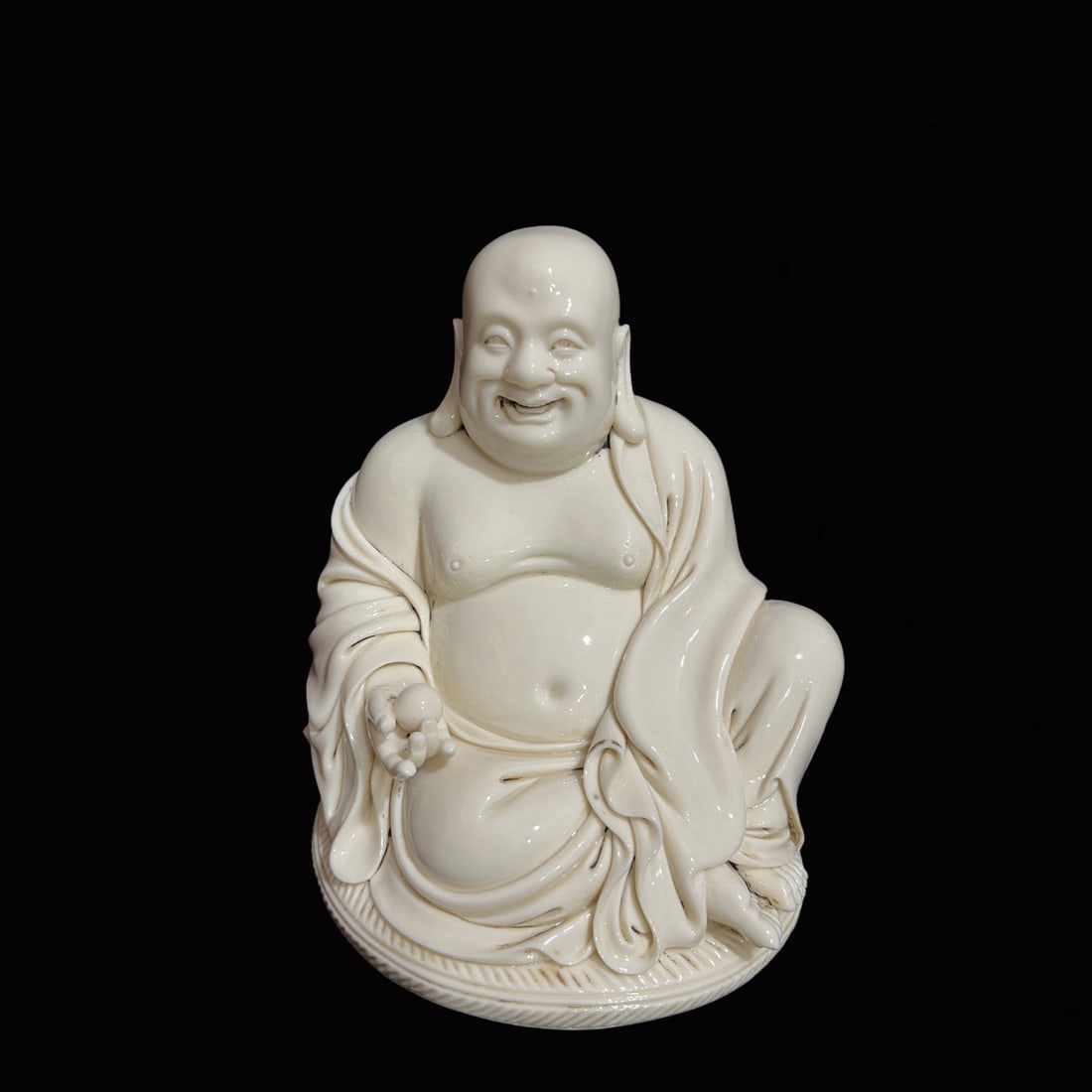 A Solemn Blance-De-Chine Statue of Maitreya Buddha (1 of 7)