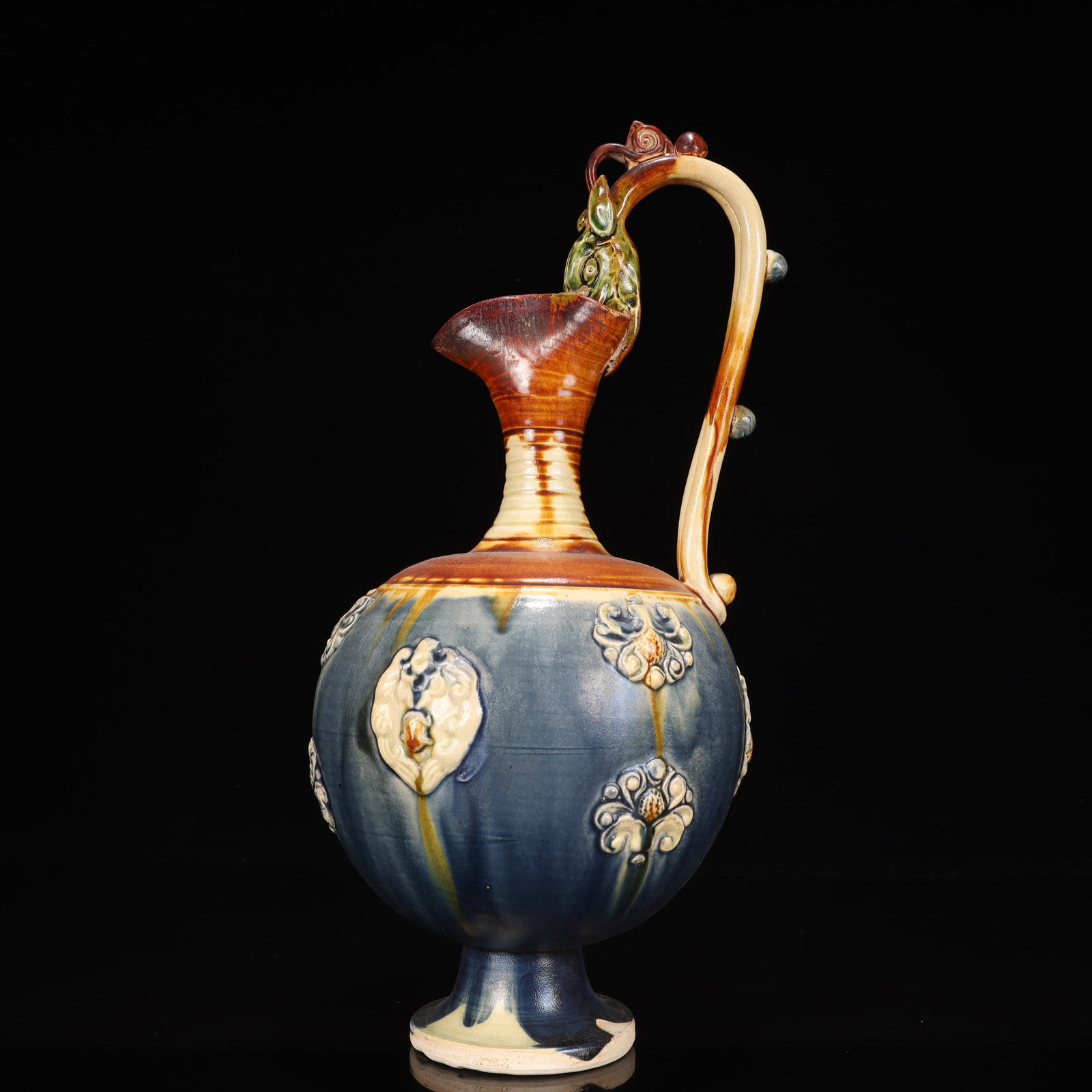 A Rare Tang Tri-Color Glazed Pottery Flower Pattern Dragon-Handle Ewer: A Rare Tang Tri-Color Glazed Pottery Flower Pattern Dragon-Handle Ewer,Tang Dynasty, China,Size:6.7inx6.9inx15in,Weight:1850g 唐三彩花卉纹龙柄执&#