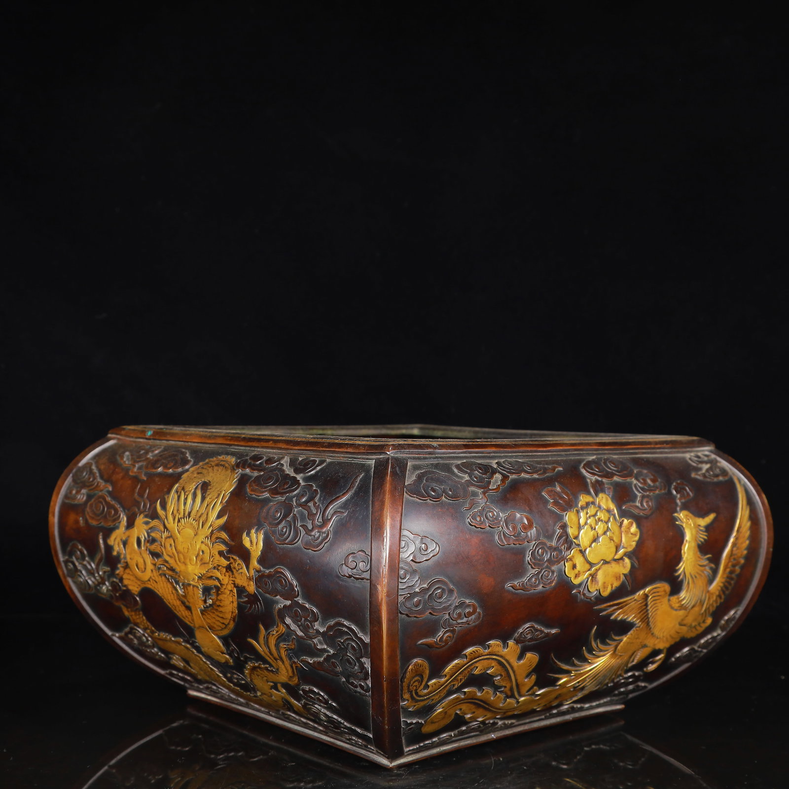 A Rare Bronze Dragon and Phoenix Pattern Censer: A Rare Bronze Dragon and Phoenix Pattern Censer,Ming Dynasty,China,Xuande Six-character Mark,Size:11.8inx6.7in,Weight:6750g 铜龙凤纹香炉,中国明