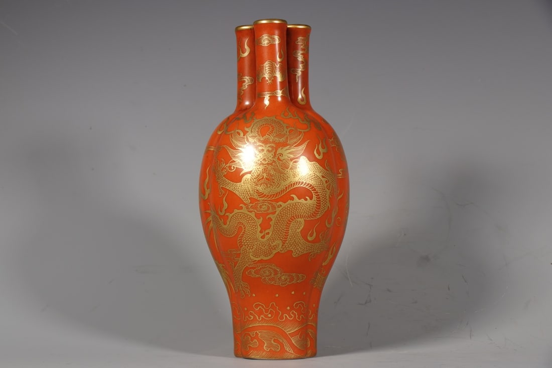 An Exquisite Red Glazed Painted Gold Auspicious Cloud and Dragon Pattern Vase: An Exquisite Red Glazed Painted Gold Auspicious Cloud and Dragon Pattern Vase,Qing Dynasty,China,Qianlong Six-character Mark,Size:8.9inx2.2in 红釉描金祥云龙&#