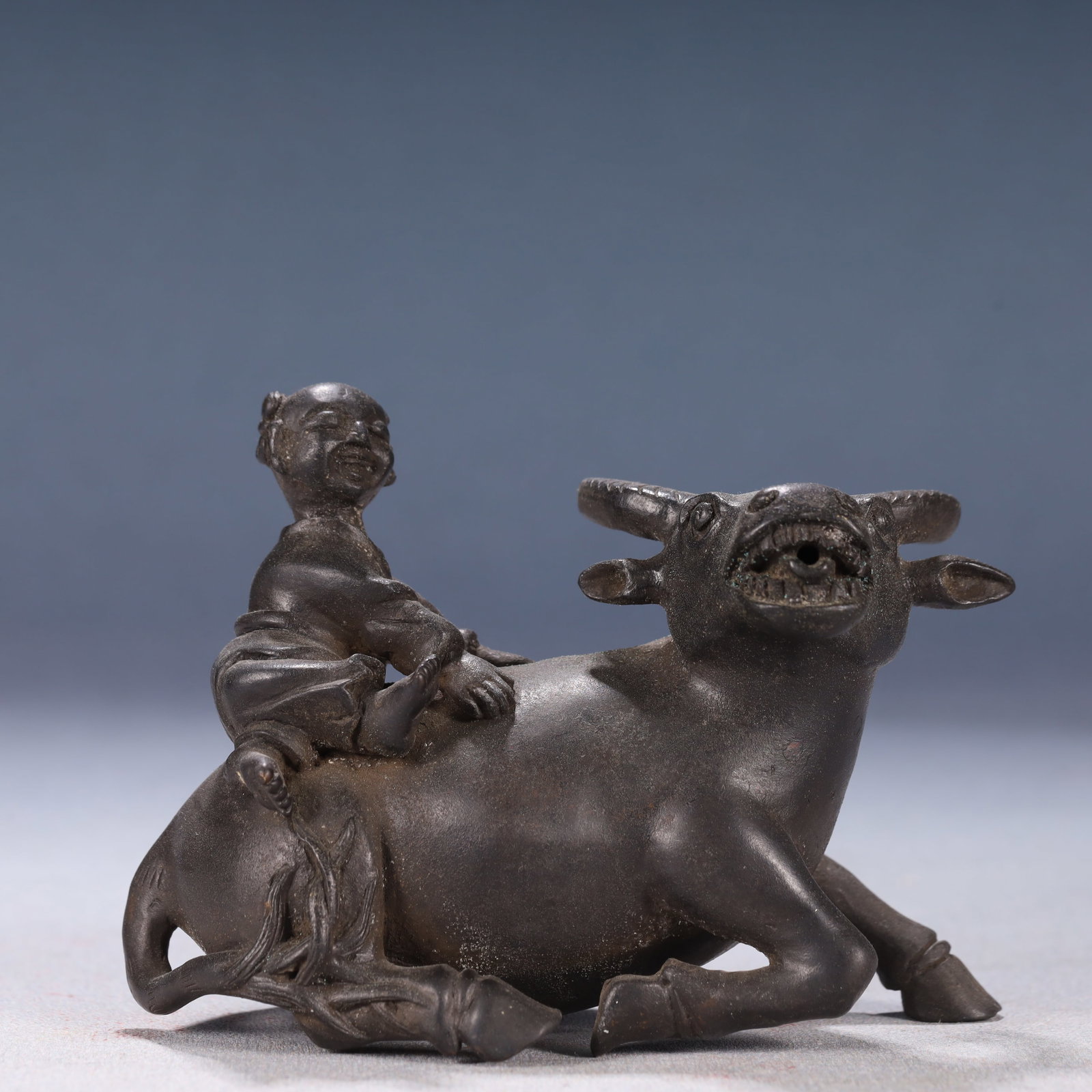 An Exquisite Silver Figure Riding Buffalo Ornament: An Exquisite Silver Figure Riding Buffalo Ornament,Qing Dynasty,China 银人物骑牛摆件,中国清代
