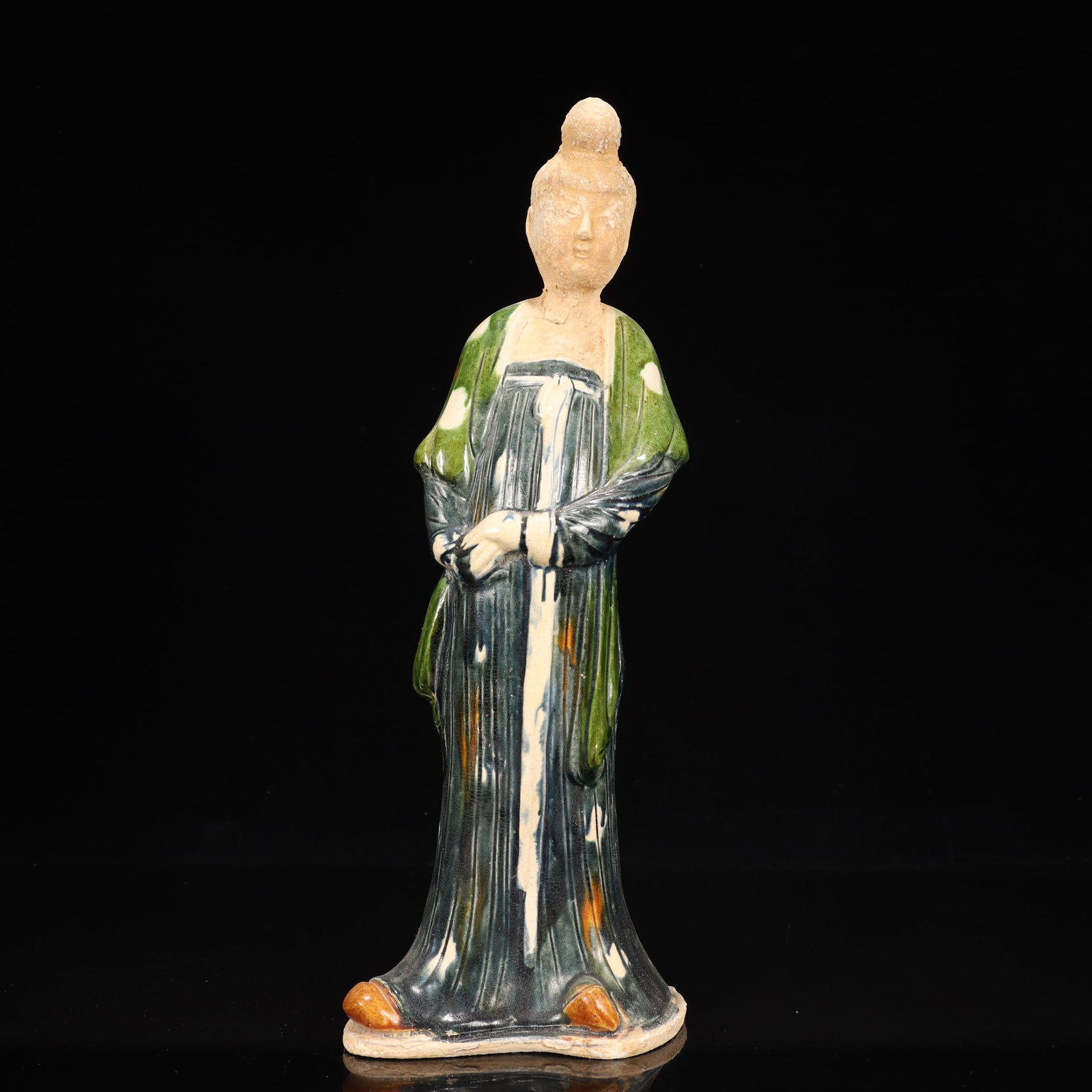 A Rare Tang Tri-Color Glazed Pottery Woman Ornament: A Rare Tang Tri-Color Glazed Pottery Woman Ornament,Tang Dynasty, China,Chinese Tang Tri-colored Pottery, or Tang Sancai, flourished during the Tang Dynasty (618–907 AD). It's renowned for its v