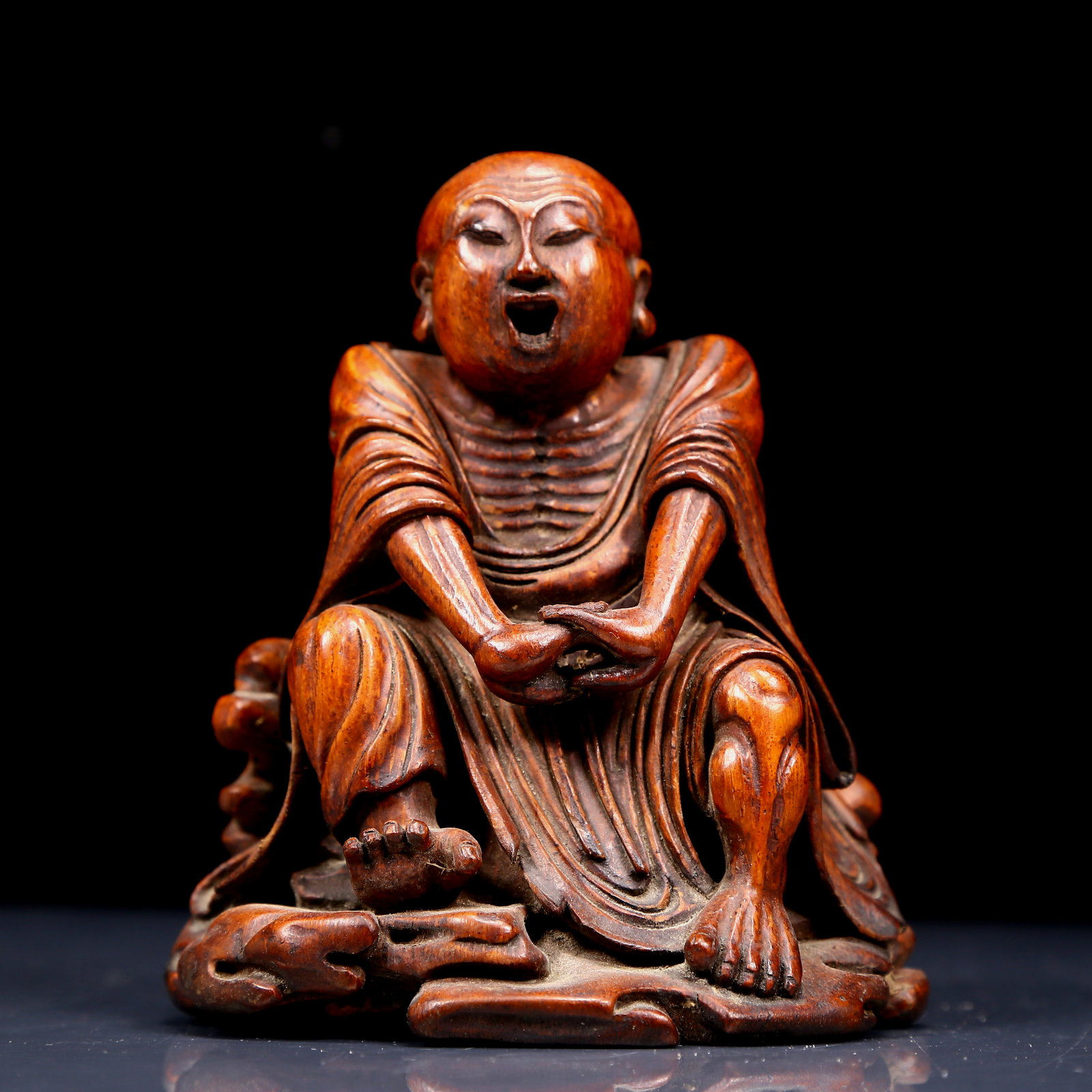 An Exquisite Bamboo Statue of Arhat: An Exquisite Bamboo Statue of Arhat,Qing Dynasty, China,With Mark,Size:4.9inx4.3inx5.9in,Weight:345g 竹雕罗汉像，清代，带款