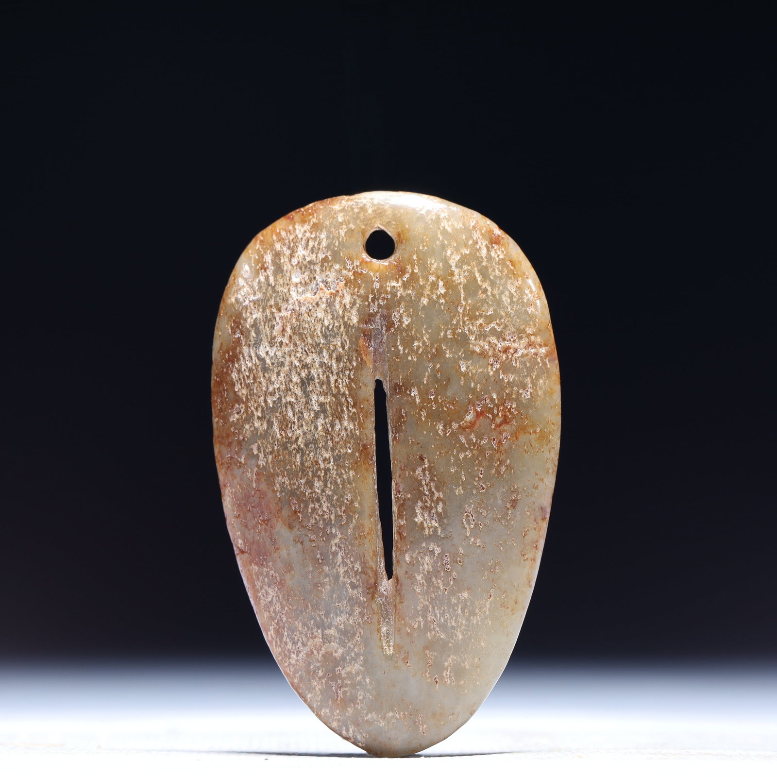 An Archaic Hongshan Culture Greenish Jade Pendant: An Archaic Hongshan Culture Greenish Jade Pendant,Ancient Time,China,Size:1.6inx0.1inx2.4in,Weight:24g 红山文化青白玉挂件,中国新