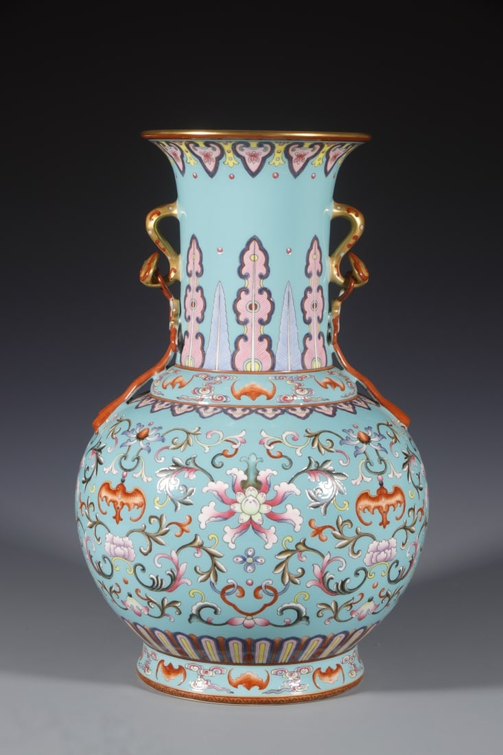 A Rare Turquoise Glazed Lotus Pattern Double-Ears Vase: A Rare Turquoise Glazed Lotus Pattern Double-Ears Vase,Qing Dynasty,China,Qianlong Six-character Mark,Size:14.2inx5.9in 松石绿釉缠枝莲纹双耳