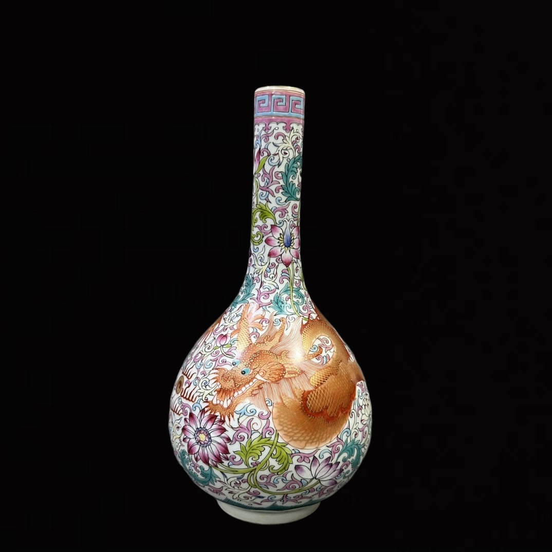 An Exquisite Famille-Rose Lotus and Dragon Pattern Vase: An Exquisite Famille-Rose Lotus and Dragon Pattern Vase,Qing Dynasty,China,Qianlong Six-character Mark,Size:4.3inx6.7in