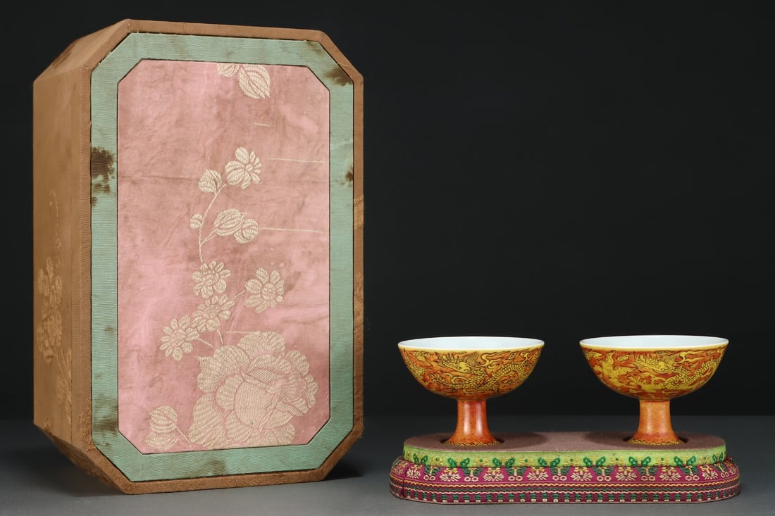 A Pair of Exquisite Red Ground Yellow Glazed Auspicious Cloud and Dragon Pattern Stem Cups: A Pair of Exquisite Red Ground Yellow Glazed Auspicious Cloud and Dragon Pattern Stem Cups,Ming Dynasty,China,Jiajing Six-character Mark,Size:2.6inx3.5in 一对红地黄ດ