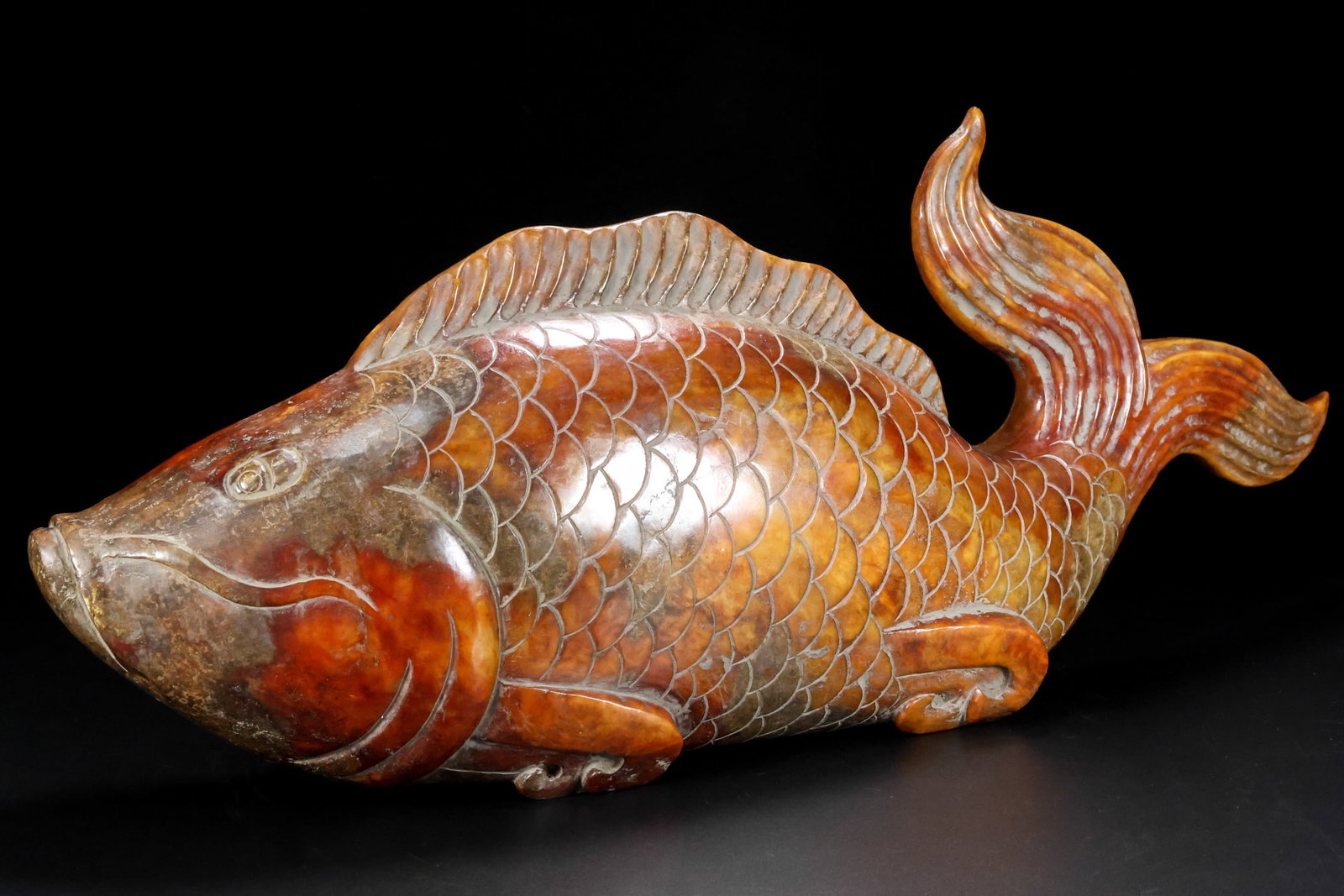 An Exquisite Archaic Jade Fish Ornament (1 of 9)