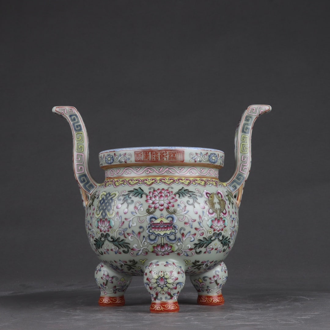 An Exquisite Celadon Glazed Famille-Rose Lotus Pattern Double-Ears and Tripod Censer: An Exquisite Celadon Glazed Famille-Rose Lotus Pattern Double-Ears and Tripod Censer,Qing Dynasty,China,Qianlong Six-character Mark,Size:7.5inx8.3in 青釉粉彩缠枝