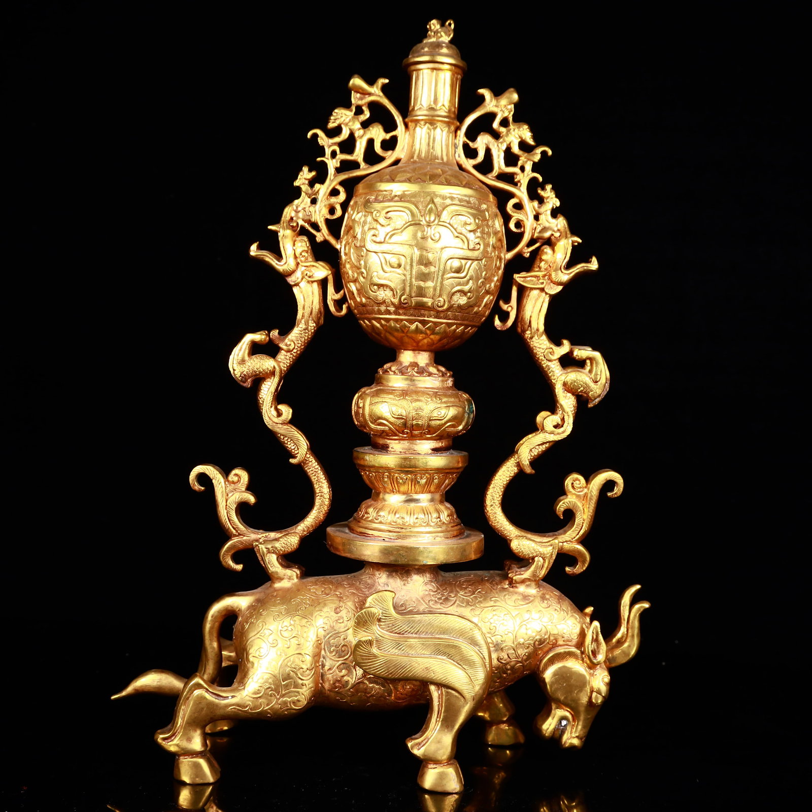 A Rare Gilt Bronze Buffalo and Dragon Pattern Censer: A Rare Gilt Bronze Buffalo and Dragon Pattern Censer,The Warring States period in China,With Mark,Size:12.2inx3.9inx16.9in,Weight:6450g 铜鎏金牛龙纹香炉