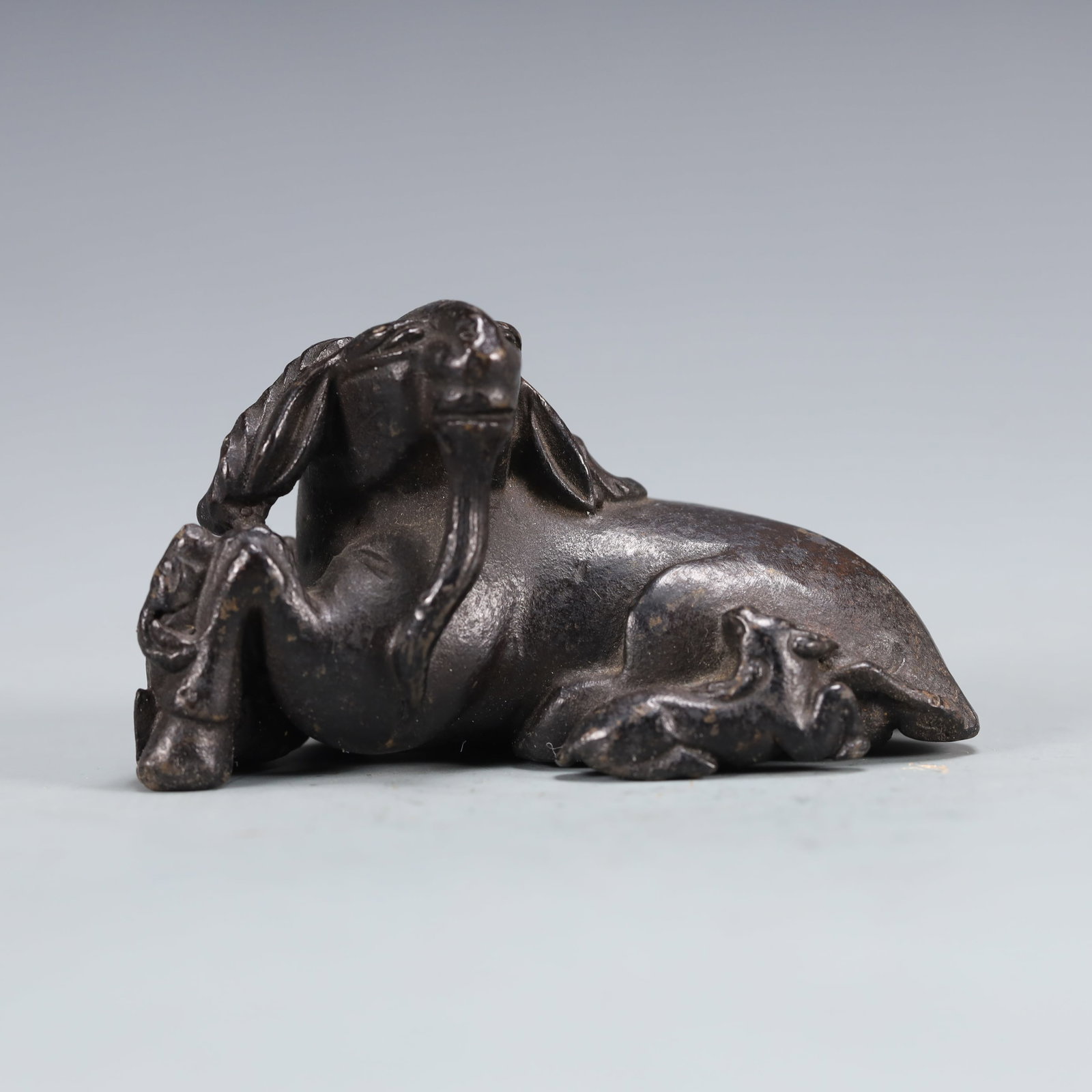 An Exquisite Bronze Auspicious Beast Ornament: An Exquisite Bronze Auspicious Beast Ornament,Qing Dynasty, China,Size:2.8inx1.5inx1.6in Weight:200g 铜瑞兽摆件,中国清代