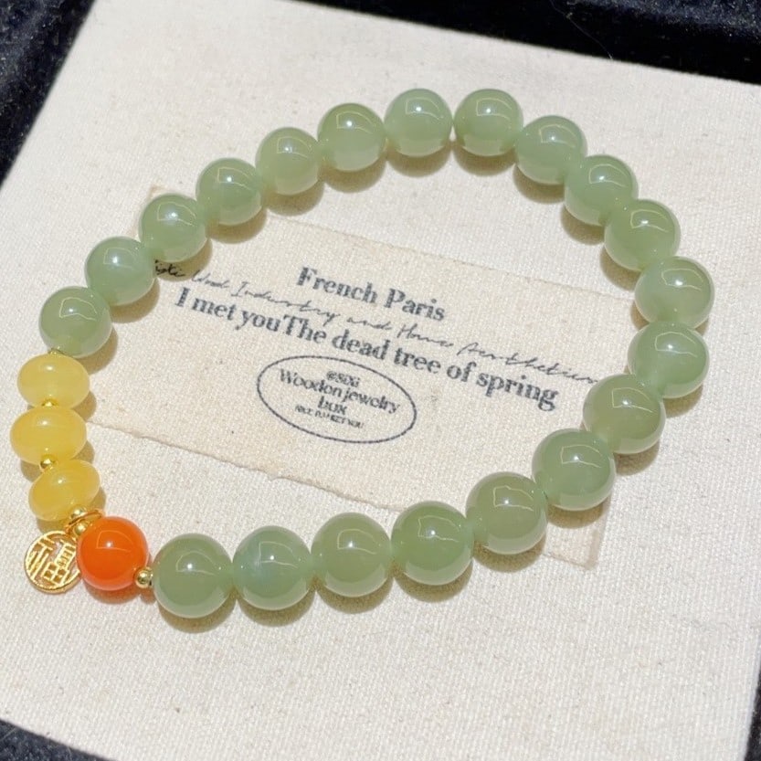 An Exquisite Greenish Jade With Beeswax Bracelet: An Exquisite Greenish Jade With Beeswax Bracelet,Size:0.3in 青玉配蜜蜡手串