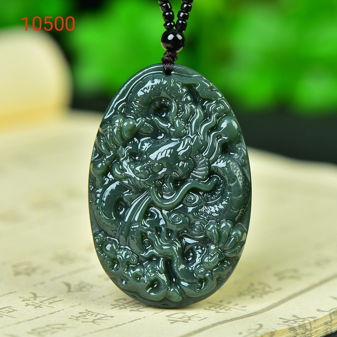 An Exquisite Sapphire Dragon Pattern Pendant: An Exquisite Sapphire Dragon Pattern Pendant,Size:1.7inx2.5in 寓意:龙行天下 青玉龙纹吊坠