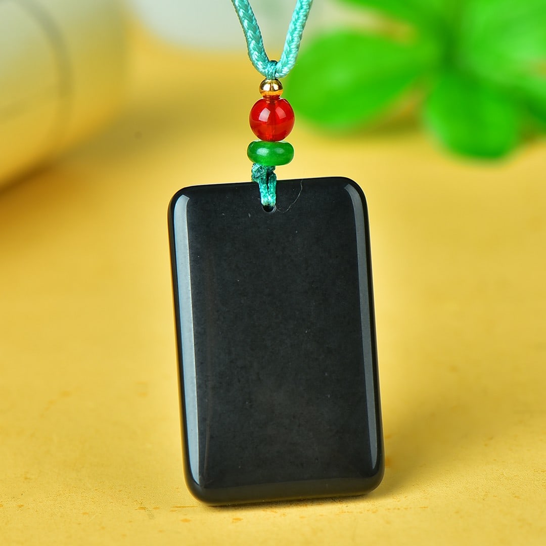 An Exquisite Black and White Jade Pendant: An Exquisite Black and White Jade Pendant,Size:1inx1.6in 黑玉挂件