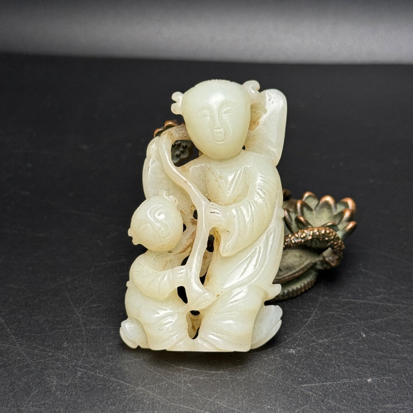 An Exquisite White Jade Figure Hand Piece: An Exquisite White Jade Figure Hand Piece,Qing Dynasty,China,Size:37mmx63mmx15mm,Weight:45g 白玉人物手把件,中国清代