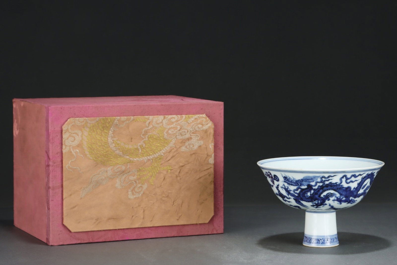 An Exquisite Blue and White Auspicious Cloud and Dragon Pattern Stem Bowl: An Exquisite Blue and White Auspicious Cloud and Dragon Pattern Stem Bowl,Ming Dynasty,China,Xuande Six-character Mark,Size:4inx6.1in 