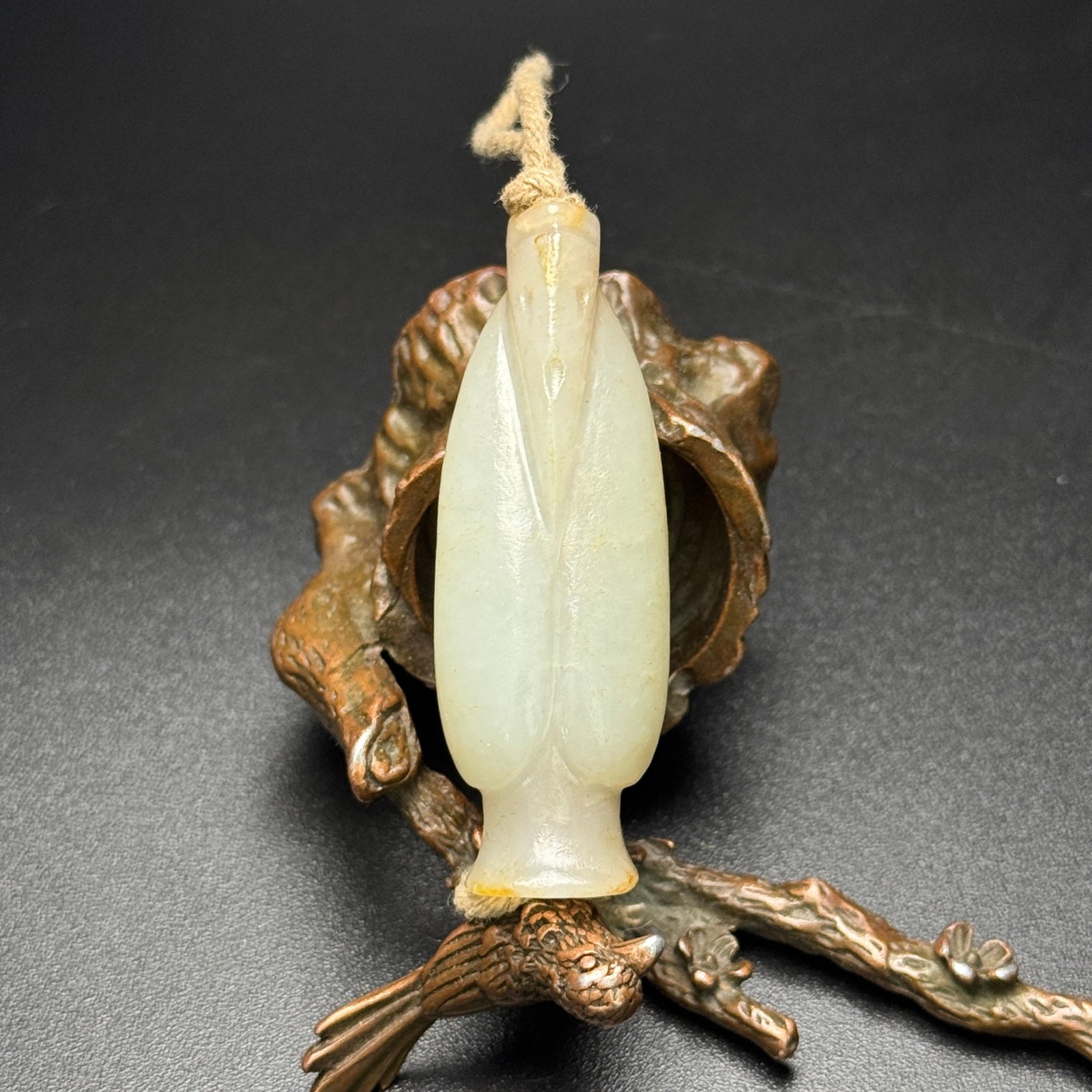 An Exquisite White Jade Figure Pendant: An Exquisite White Jade Figure Pendant,Qing Dynasty,China,Size:60mmx21mmx15mm,Weight:27g 白玉人物挂件,中国清代