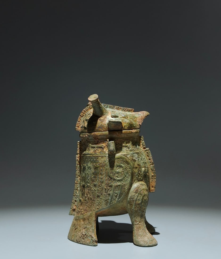 An Archaic Bronze Thunder and Cloud Pattern Beast-Shaped Food Vessel: An Archaic Bronze Thunder and Cloud Pattern Beast-Shaped Food Vessel,W.Zhou,China,Size:8.7inx5.3inx4.3in 青铜云雷纹兽形食器,中国඿