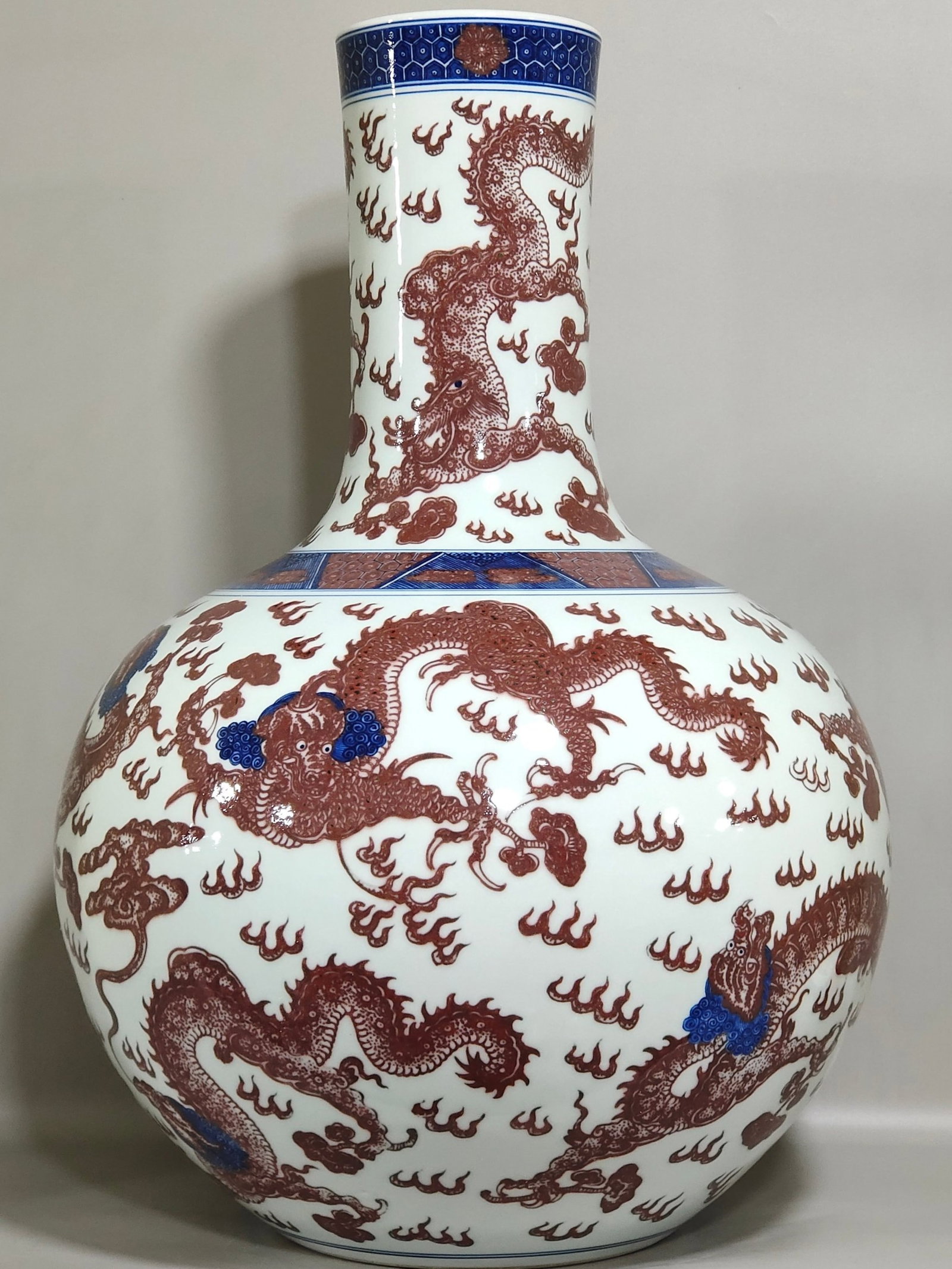 A Huge Blue and White Underglaze-Red Auspicious Cloud and Dragon Pattern Vase: A Huge Blue and White Underglaze-Red Auspicious Cloud and Dragon Pattern Vase,Qing Dynasty,China,Qianlong Six-character Mark,Size:22.4inx14.6in 
