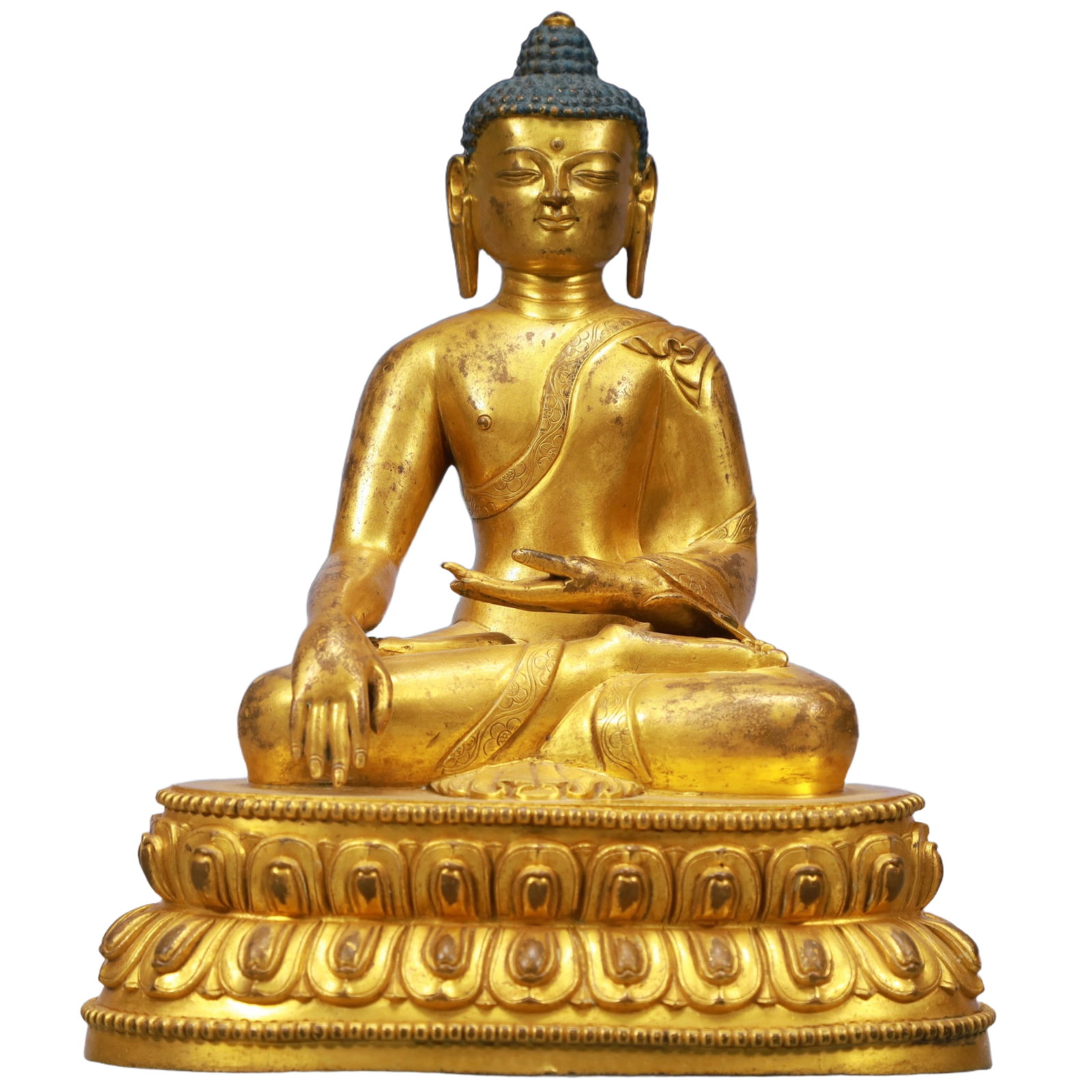 A Solemn Gilt Bronze Statue of Sakyamuni: A Solemn Gilt Bronze Statue of Sakyamuni,Qing Dynasty, China,Size:7.5inx5.1inx9.4in,Weight:3150g 铜鎏金释迦摩尼像,中国清代