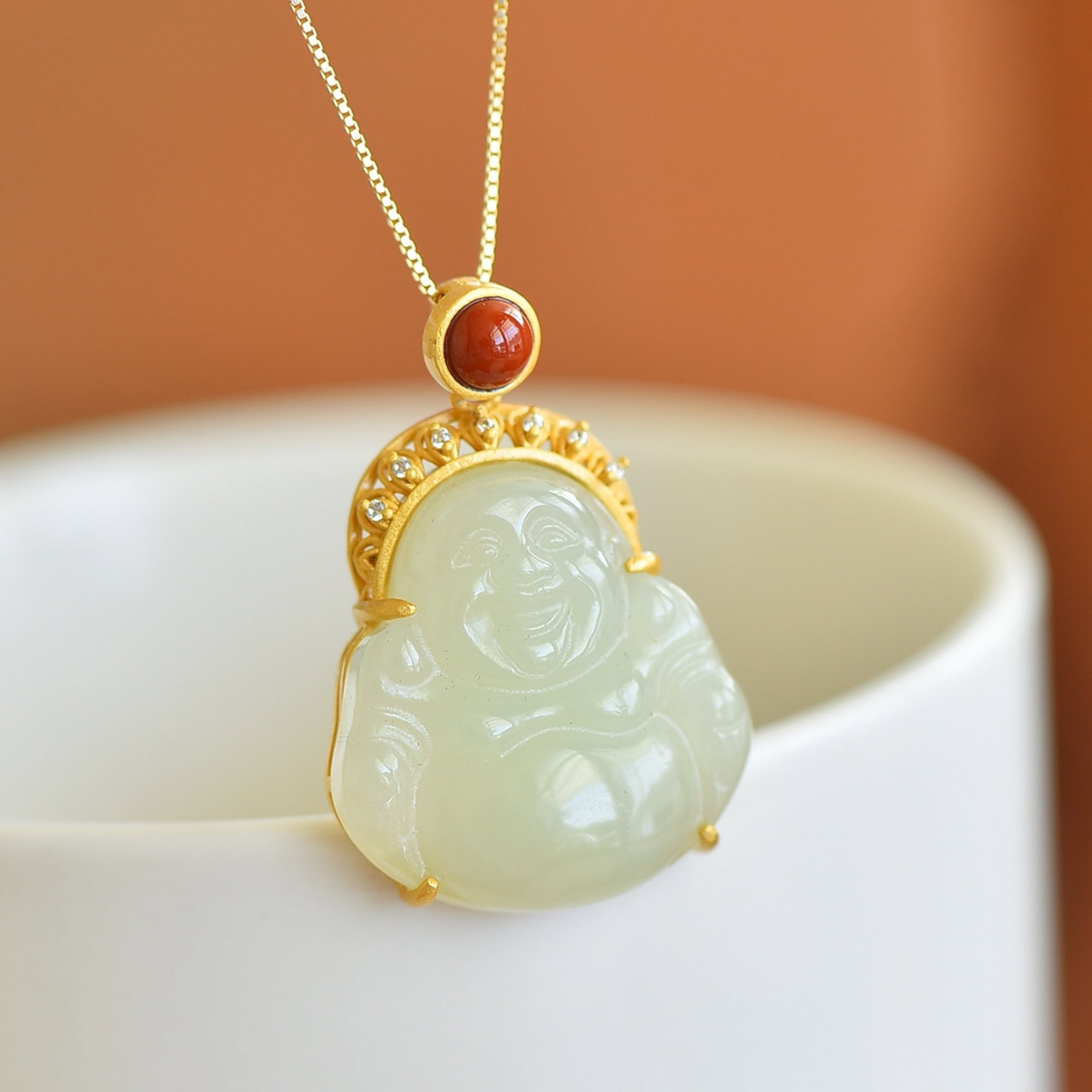An Exquisite Sterling Silver-Gold Plated Inlaid White Jade Pendant: Sterling Silver-Gold Plated Inlaid White Jade Pendant , Size :23mmx24mm 纯银镀金镶白玉吊坠,尺寸:23mmx24mm