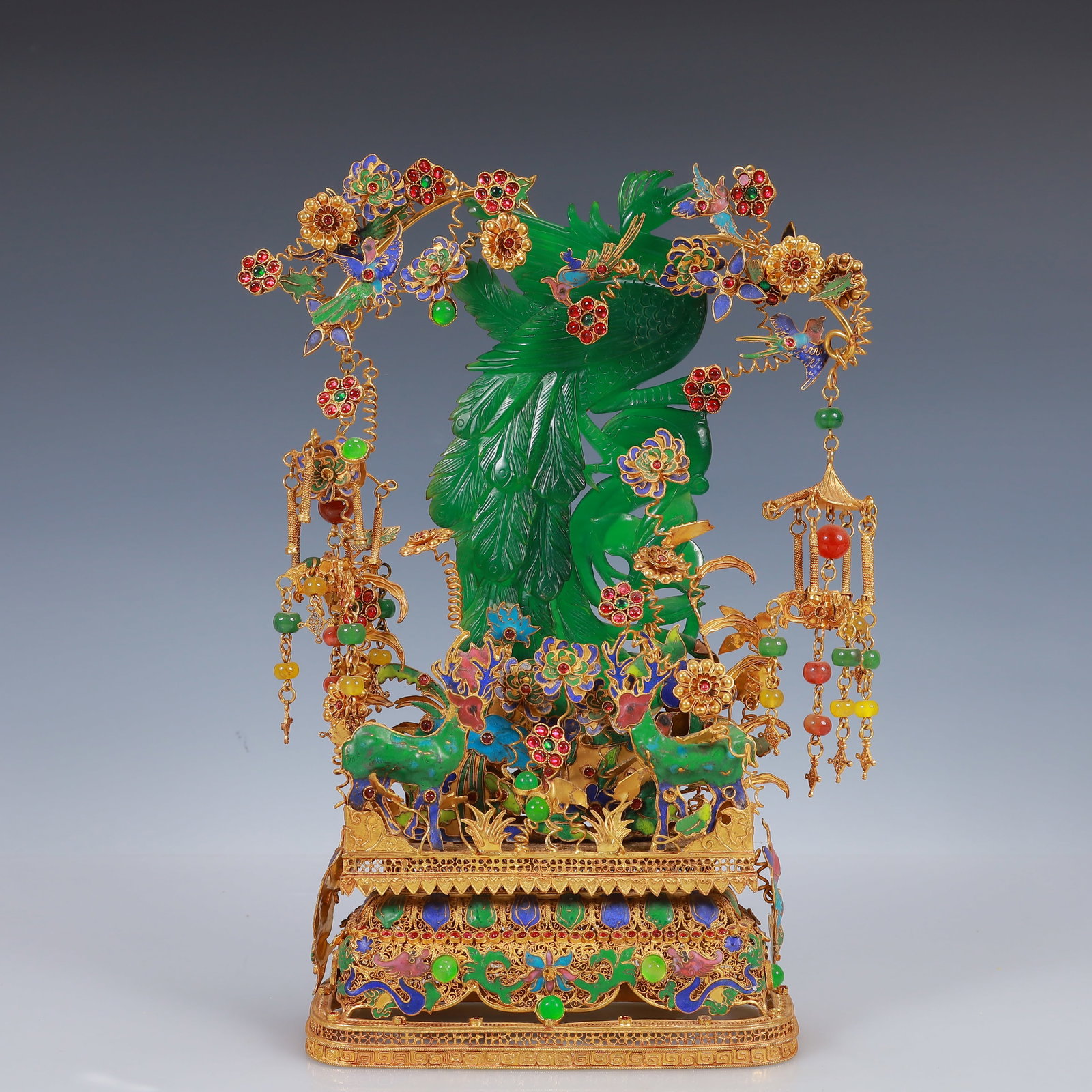 An Exquisite Filigree and Gilding Inlaid Jadeite Phoenix Ornament,Inlaid Gems: An Exquisite Filigree and Gilding Inlaid Jadeite Phoenix Ornament,Inlaid Gems,Qing Dynasty, China,Qianlong Four-Character Mark,Size:6.7inx3.1inx12.6in,Weight:1178g 花丝鎏金