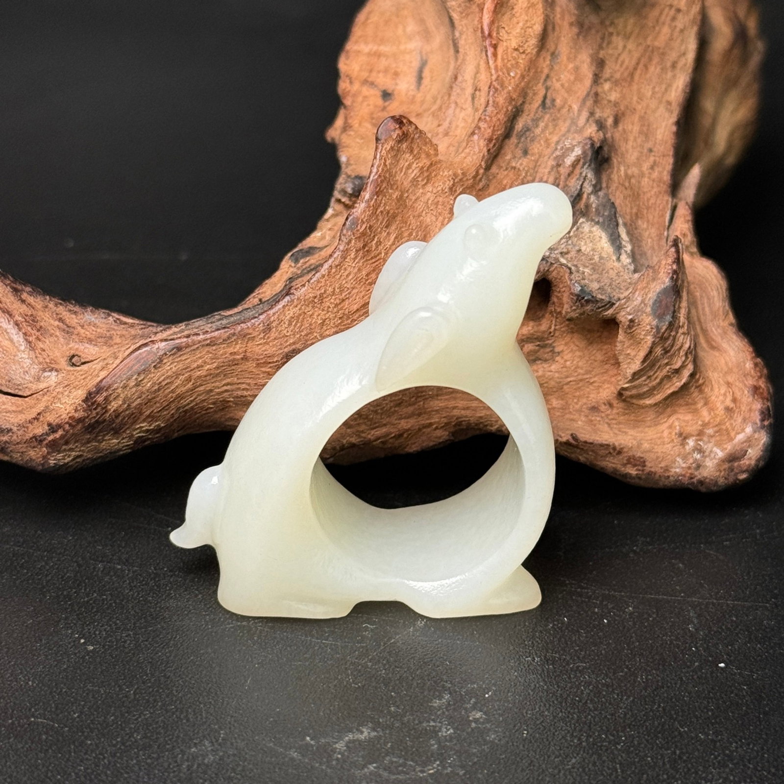 An Exquisite White Jade Sheep Pattern Fingerstall: An Exquisite White Jade Sheep Pattern Fingerstall,Qing Dynasty,China,Size:41mmx47mmx18mm,Weight:31g 白玉羊纹扳指,中国清代
