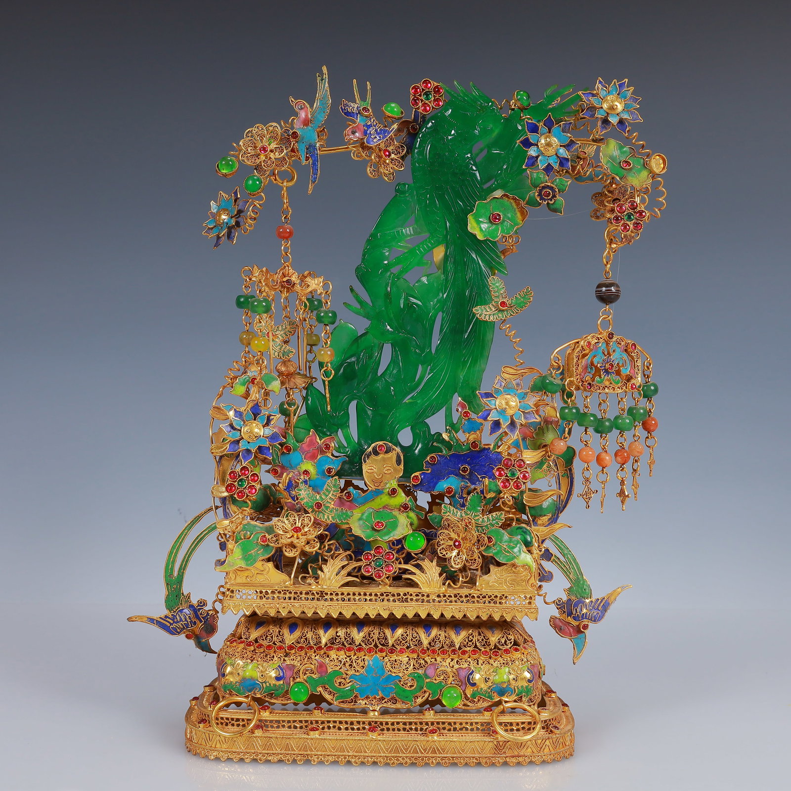 An Exquisite Filigree and Gilding Inlaid Jadeite Phoenix Ornament,Inlaid Gems: An Exquisite Filigree and Gilding Inlaid Jadeite Phoenix Ornament,Inlaid Gems,Qing Dynasty, China,Qianlong Four-Character Mark,Size:8.7inx3.9inx12.6in,Weight:1183g 花丝鎏金