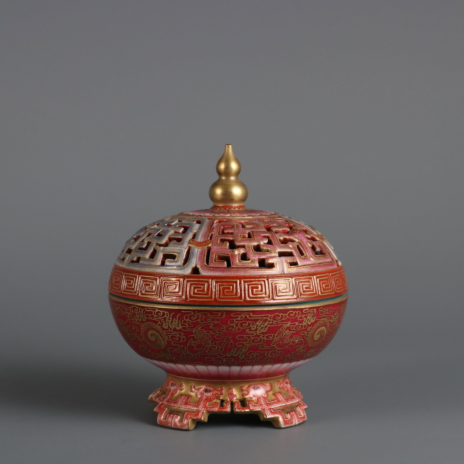 An Exquisite Famille-Rose Painted Gold Auspicious Cloud and Bats Pattern Hollow Censer: An Exquisite Famille-Rose Painted Gold Auspicious Cloud and Bats Pattern Hollow Censer ,Qing Dynasty, China,Qianlong Six-character Mark,Size:3.9inx3.5inx2.5in 粉彩描金祥&