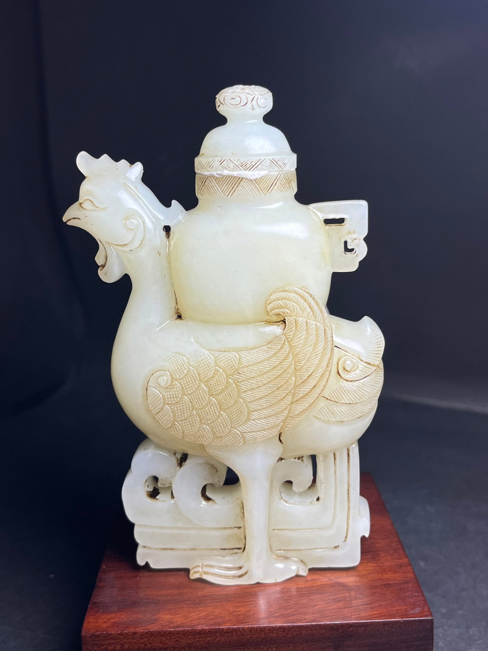 An Exquisite White Jade Phoenix-Shaped Bottle: An Exquisite White Jade Phoenix-Shaped Bottle,Qing Dynasty,China,Size:118mmx25mmx67mm,Weight:258g 白玉凤形盖瓶,中国清代
