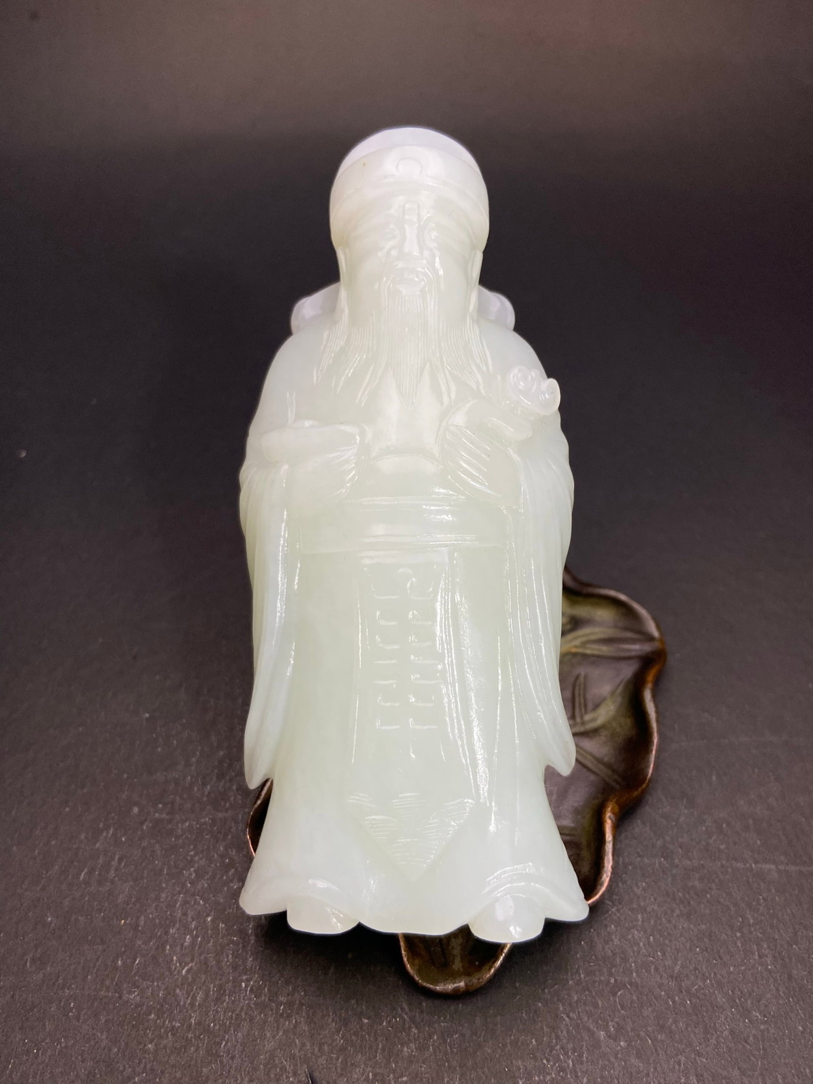 An Exquisite White Jade Statue of Mammon Ornament: An Exquisite White Jade Statue of Mammon Ornament,Qing Dynasty,China,Size:104mmx45mmx21.5mm,Weight:159g 白玉财神像摆件,中国清代